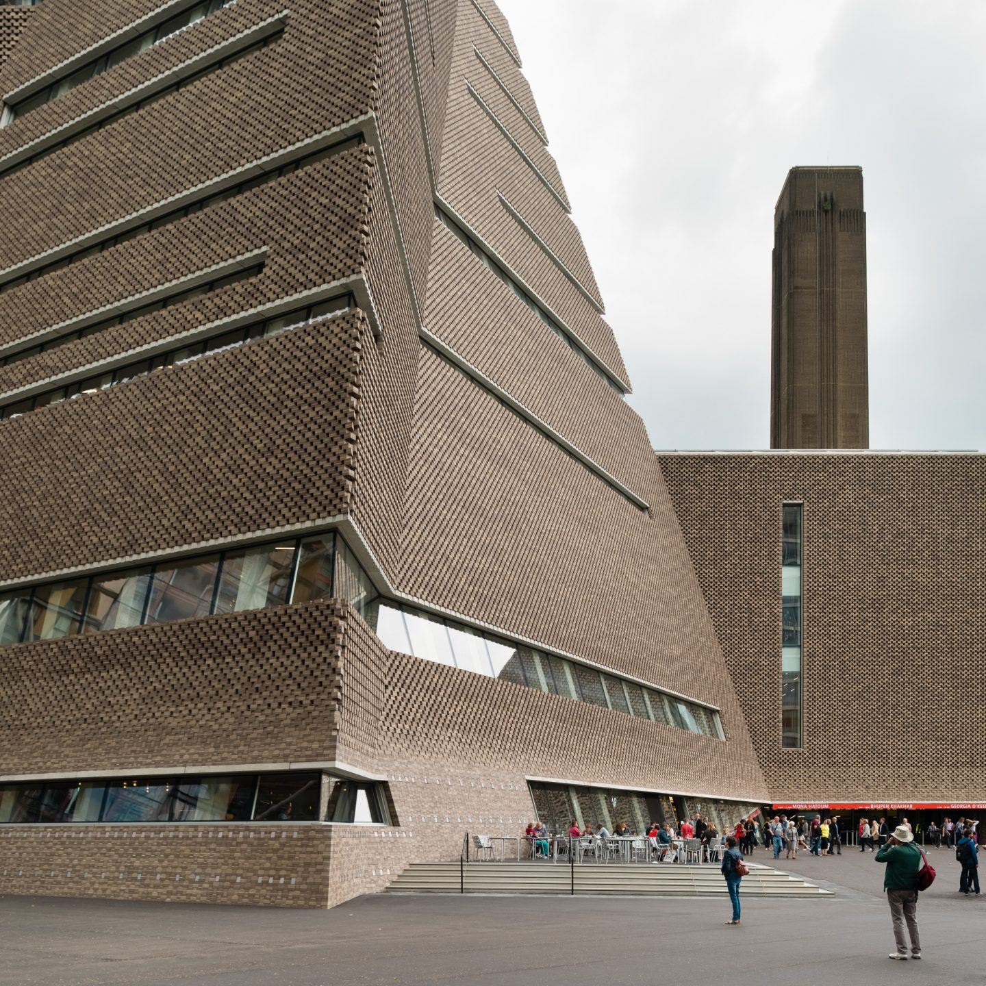 The Tate Modern by Herzog & de Meuron — Herzog & de Meuron's intervention at Tate Modern preserves Giles Gilbert Scott's original brick power station through minimal gestures.