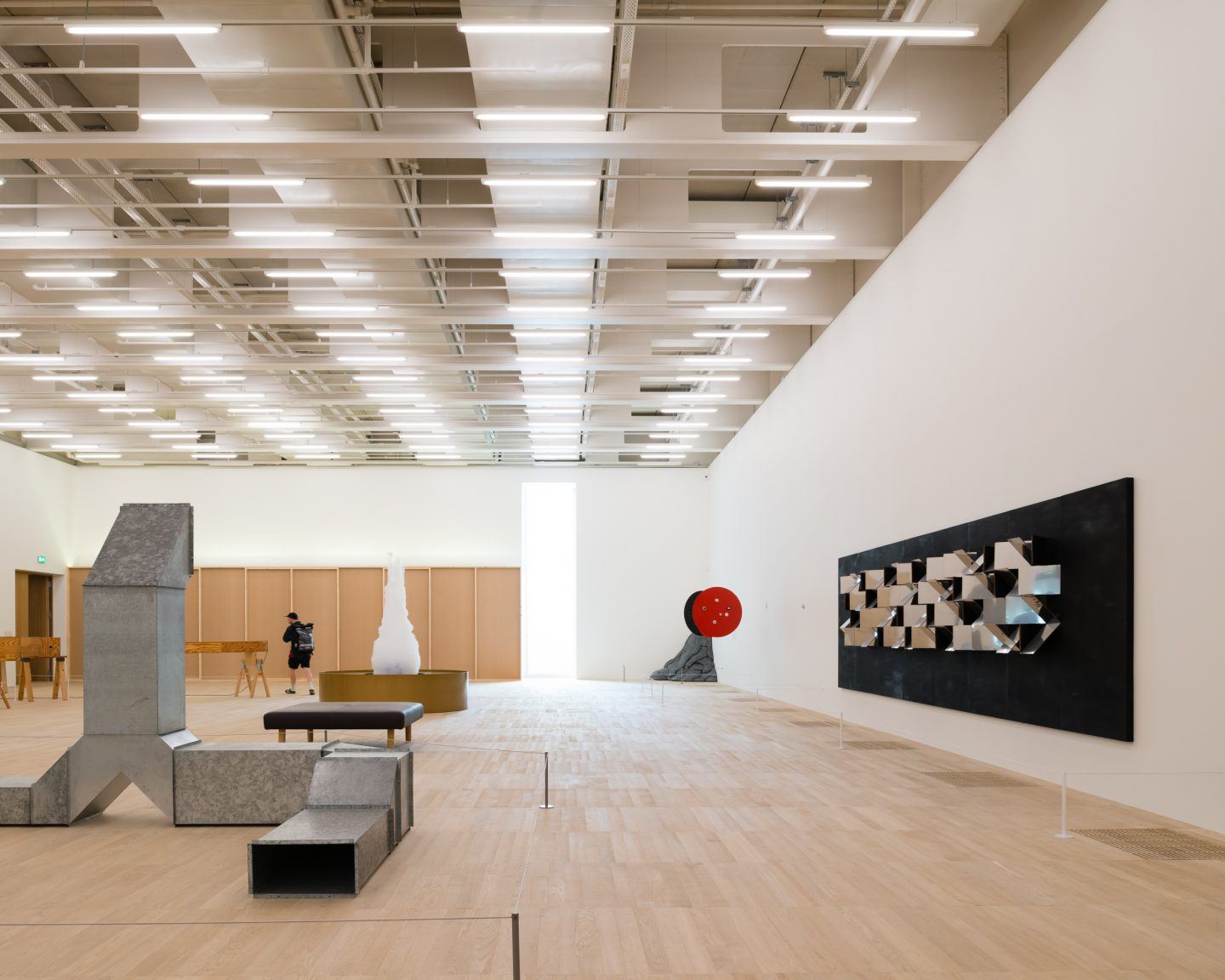 The Tate Modern by Herzog & de Meuron — A spacious gallery interior showcases Herzog & de Meuron's conversion of the Bankside Power Station with minimalist restraint.