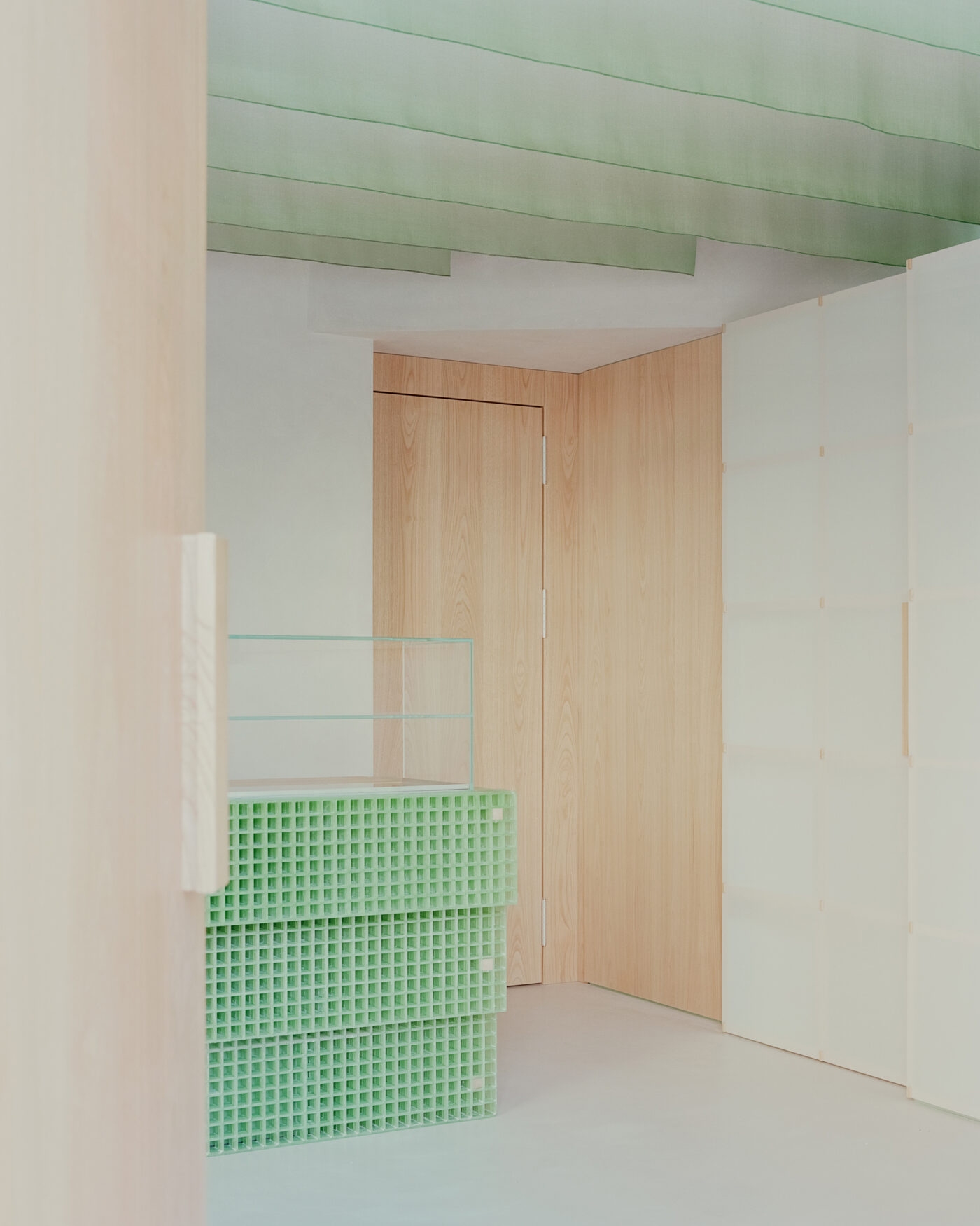 PAN Milano by studio wok — A threshold space within PAN Milano showcases studio wok's material vocabulary through a single-point perspective.