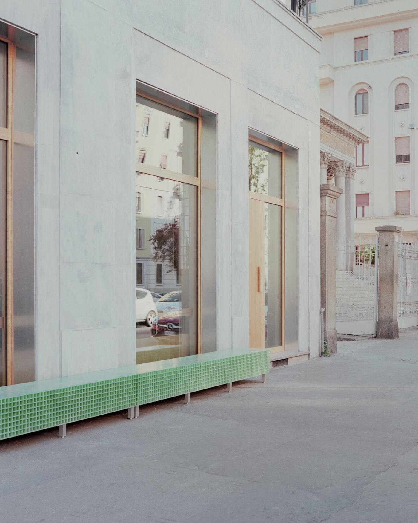 PAN Milano by studio wok — The storefront threshold at PAN Milano reveals the project's negotiation between street and interior.