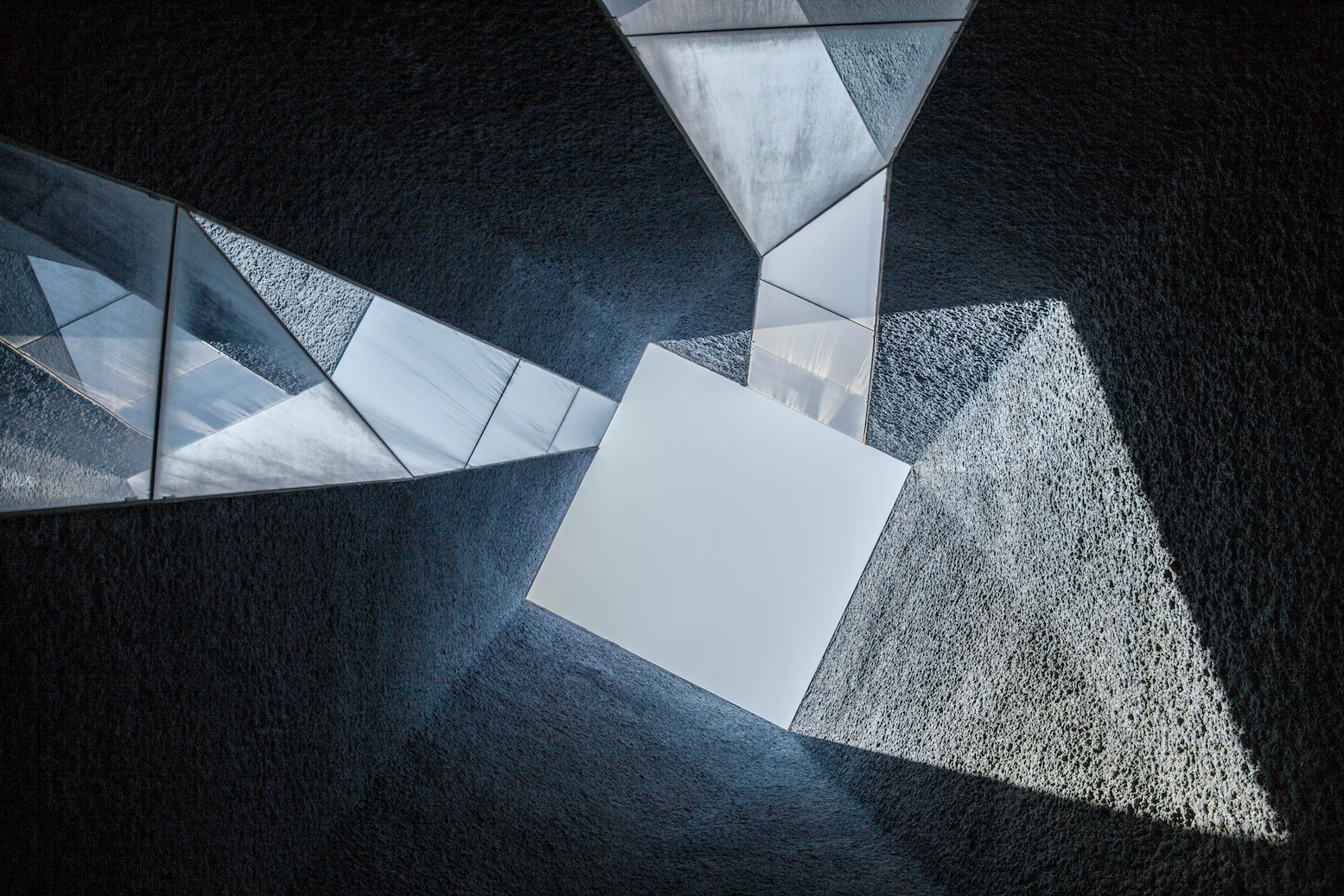 Museu Blau by Herzog & de Meuron — Denis Esakov captures the Museu Blau's monolithic concrete form from directly above, revealing nested geometric divisions and the interplay of shadow and...