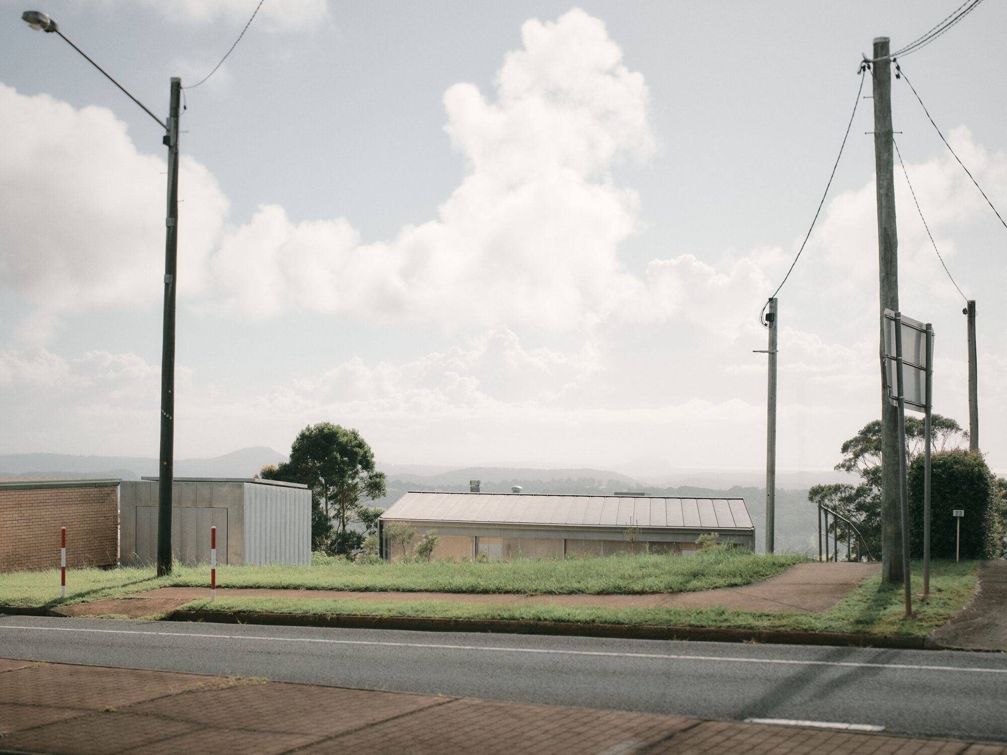 Mapleton House by Atelier Chen Hung — The entrance sequence to Mapleton House is marked by utilitarian restraint.