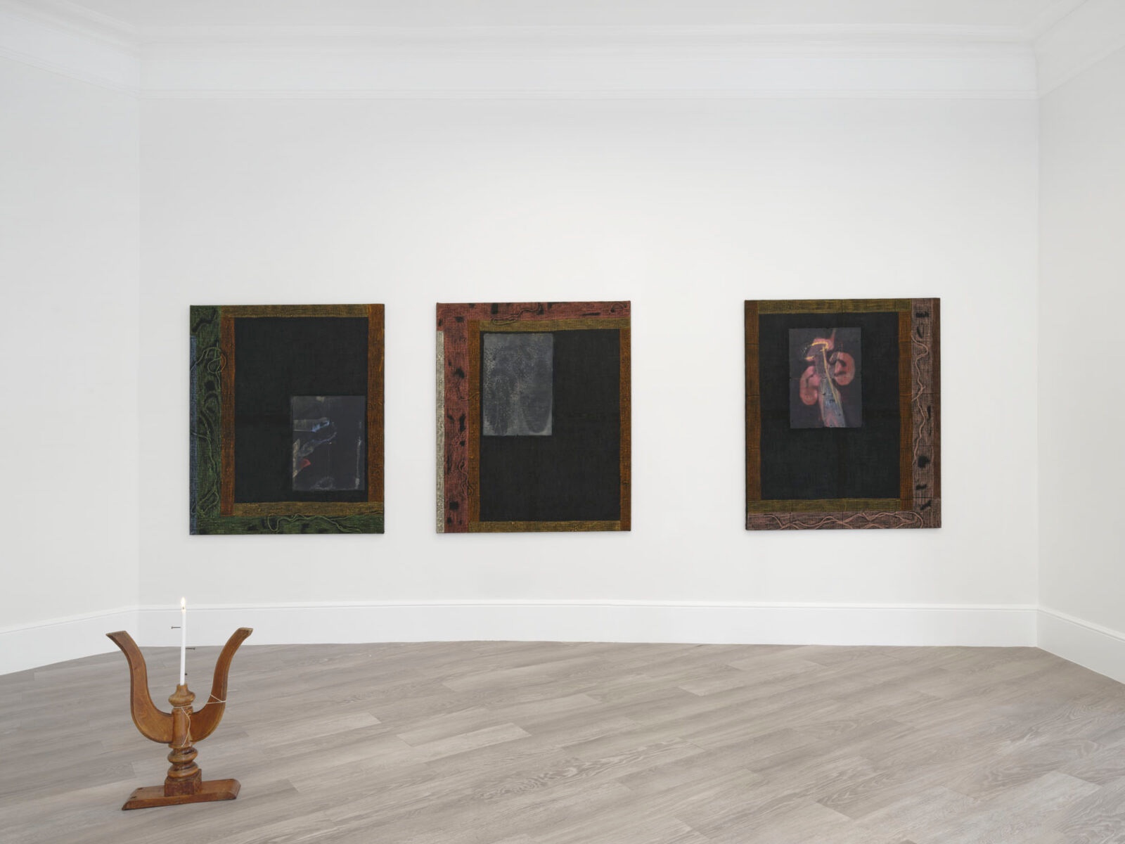 What You See is Not Here Tomorrow by Radek Brousil at Krupa Gallery — Three framed works with weathered wooden borders and dark matting occupy the gallery wall at eye level, each containing faint photographic or painted...