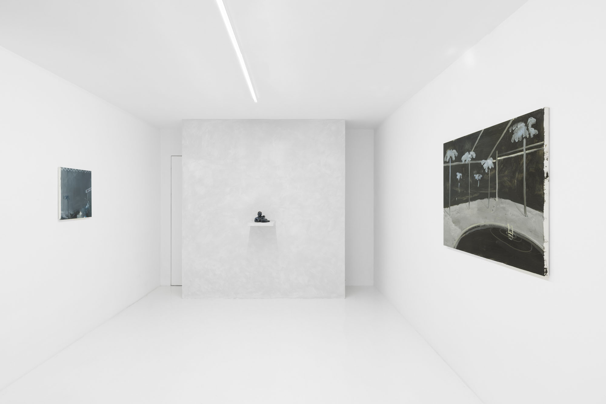Four Minutes After Sunset by Rudy Cremonini at Capsule Shanghai — A white gallery interior featuring a centralized white cylindrical plinth supporting a framed photograph at eye level.