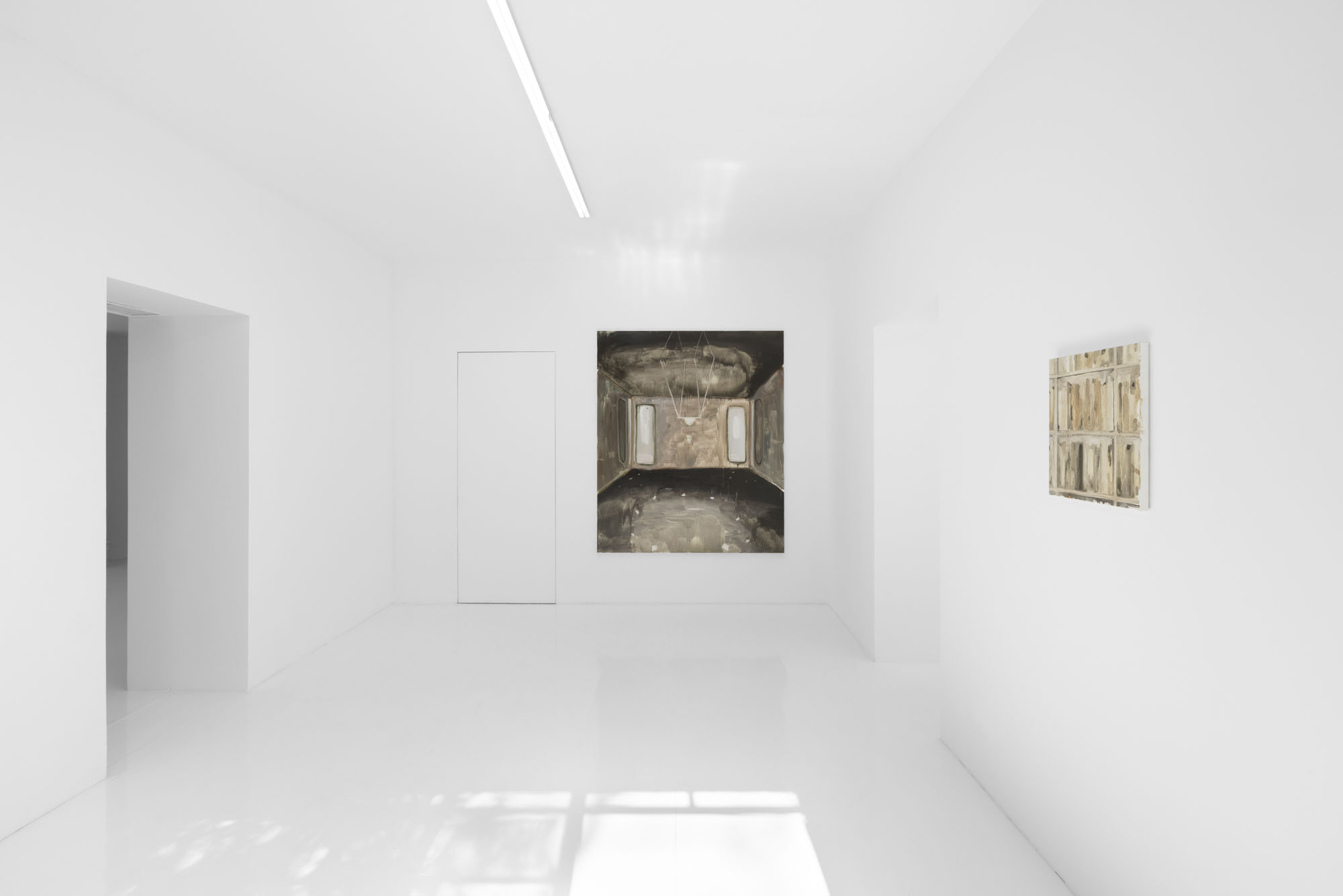 Four Minutes After Sunset by Rudy Cremonini at Capsule Shanghai — A sparse gallery interior with polished flooring reflects overhead linear lighting.