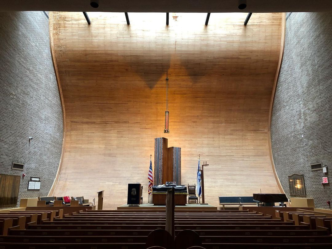 Civic Center Synagogue by William H. Breger — Interior view of the Civic Center Synagogue's sanctuary, photographed from the rear pews looking toward the ark.