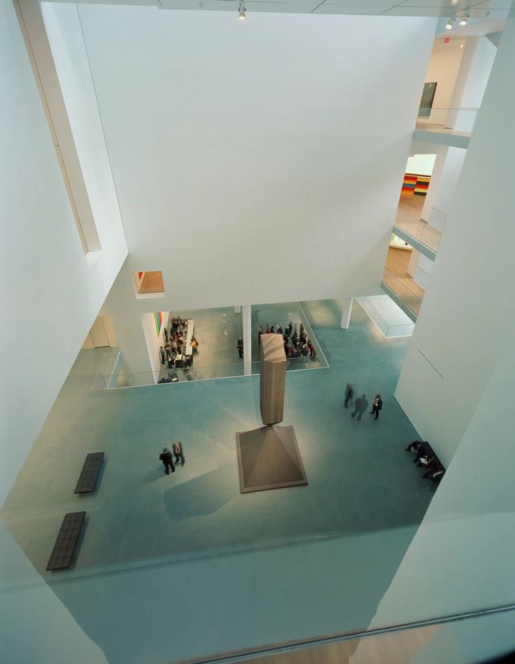 Museum of Modern Art in New York by Yoshio Taniguchi — Overhead view of MoMA's atrium space designed by Yoshio Taniguchi, revealing the architectural strategy of vertical transparency and spatial clarity.