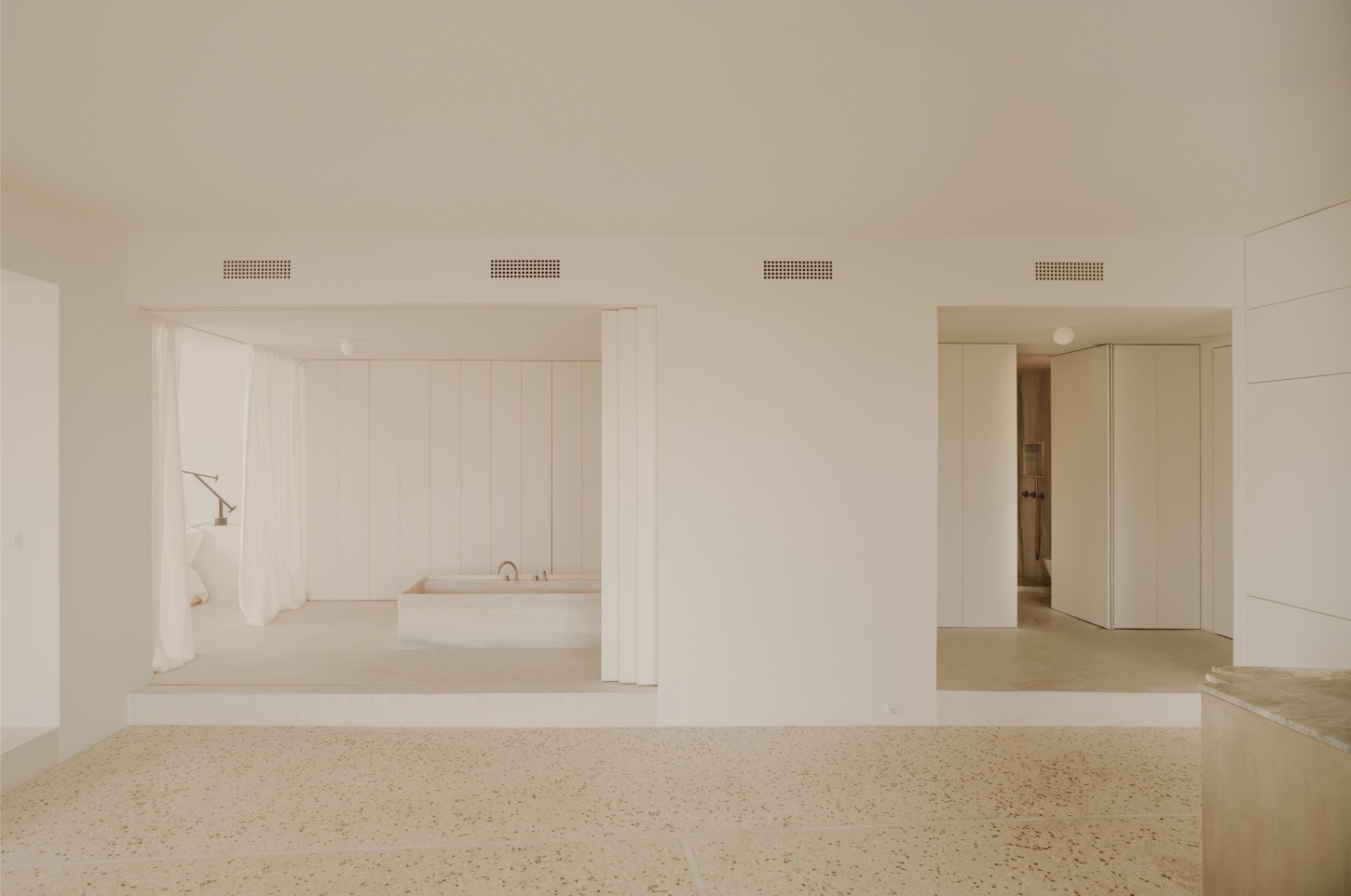 'Astral Weeks' by Oblique — A sectional view of the apartment's dual-zone layout, with the bathing chamber elevated on a platform to the left and the dressing area positioned to the right.