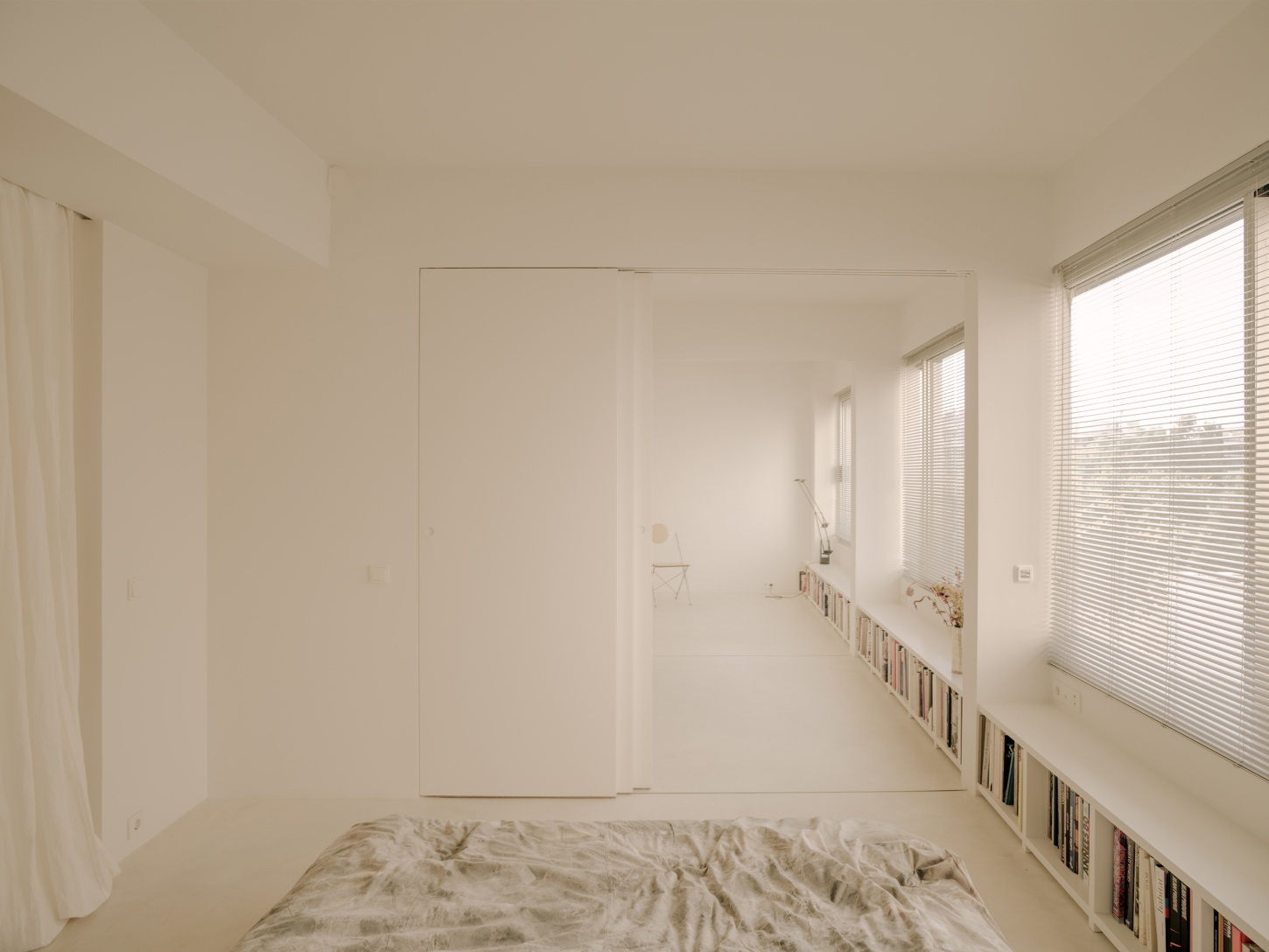 'Astral Weeks' by Oblique — A bedroom within the converted 1970s office building demonstrates the project's spatial negotiation with existing infrastructure.