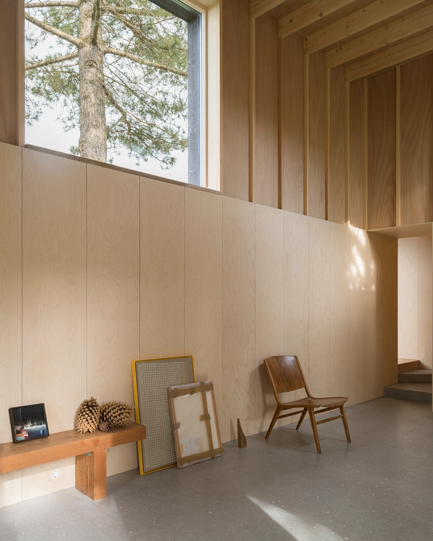 House with a Hidden Atrium by Förstberg Ling — A timber-lined interior volume showcases the project's material restraint and spatial composition.