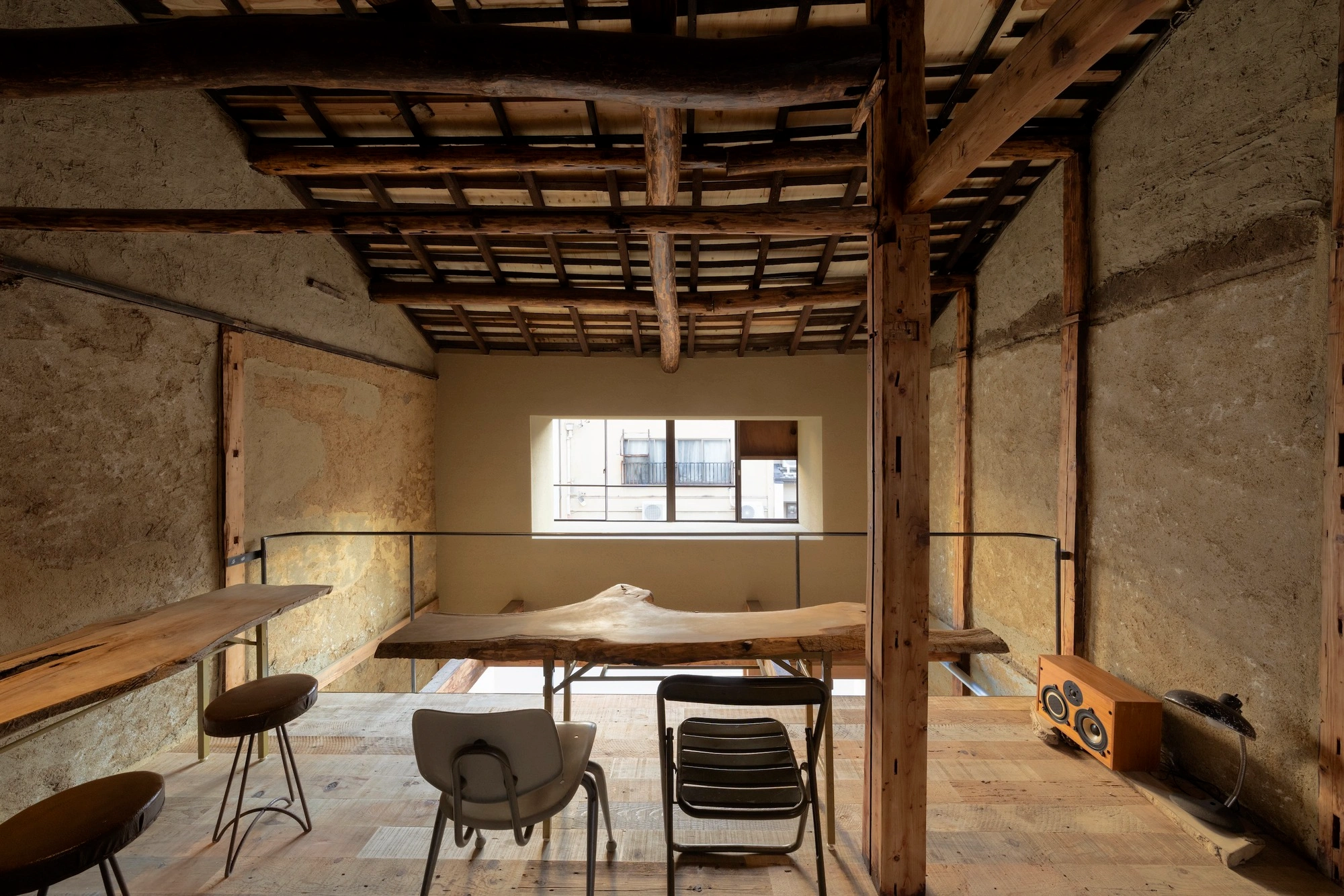 HOO Cafe Kyoto by Koyori Architects — Interior view of HOO Cafe revealing the adaptive reuse strategy within a traditional Kyomachiya.