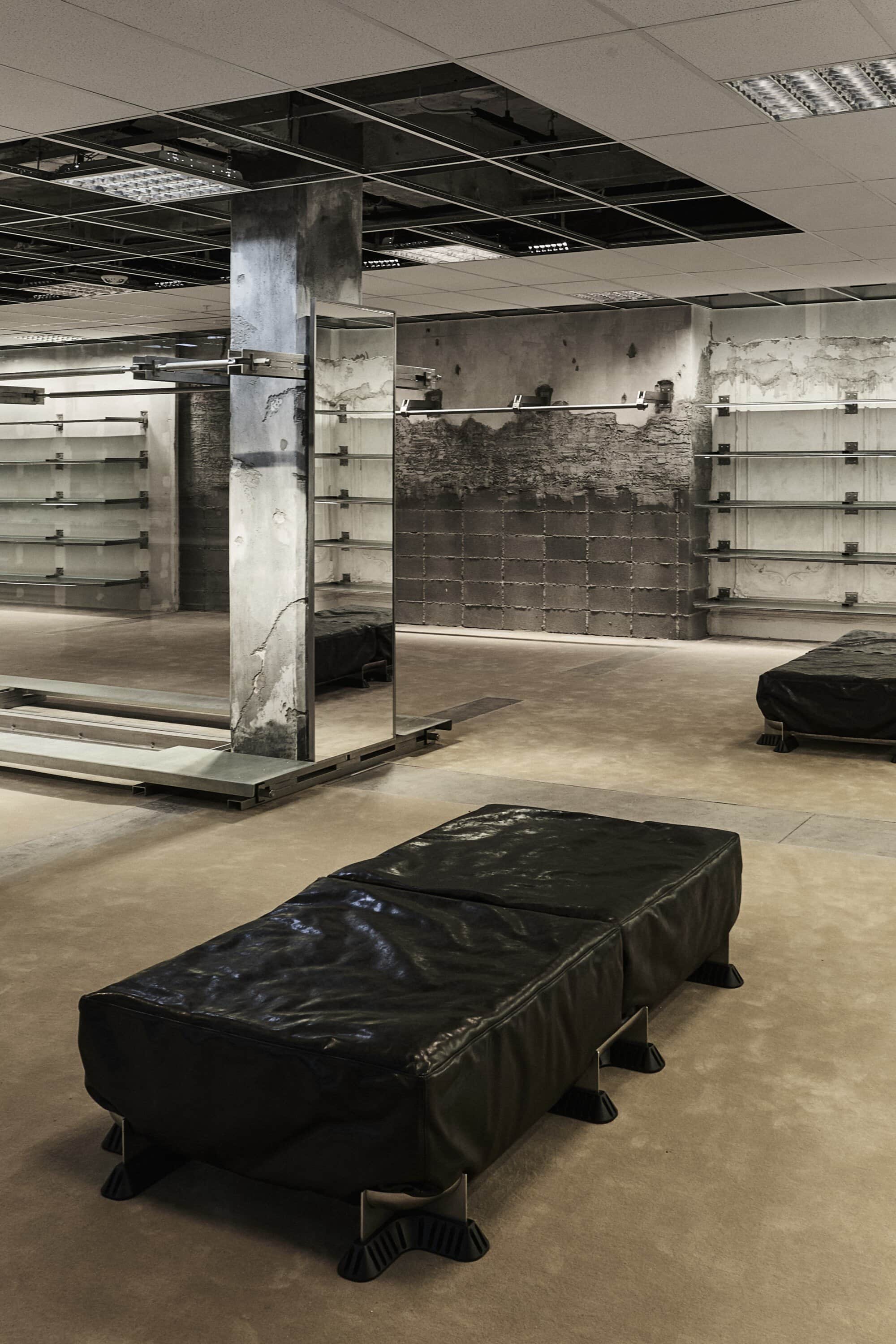 Balenciaga Greene Street Flagship Store in New York — The ground floor retail space showcases Balenciaga's material restraint strategy through a spare, column-punctuated layout.