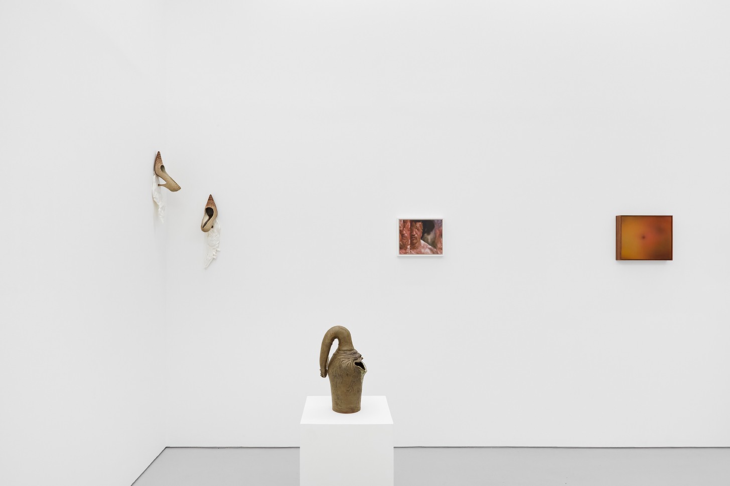 Morphogenesis at Xxijra Hii — The gallery installation presents a spatial arrangement of distinct sculptural and pictorial works across a white-walled interior.
