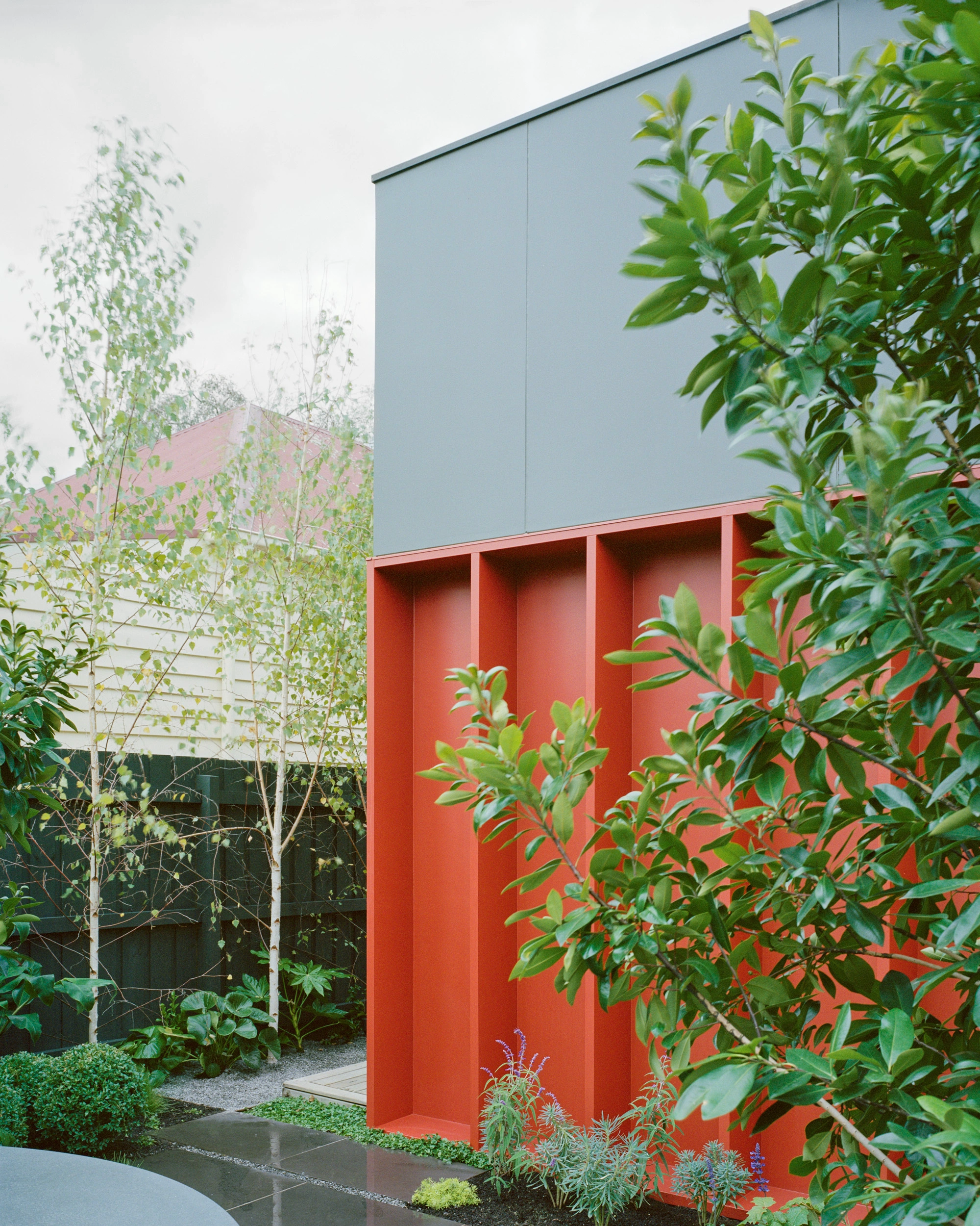 House K by Kart Projects — House K's lean extension articulates a bold chromatic strategy through layered materiality.