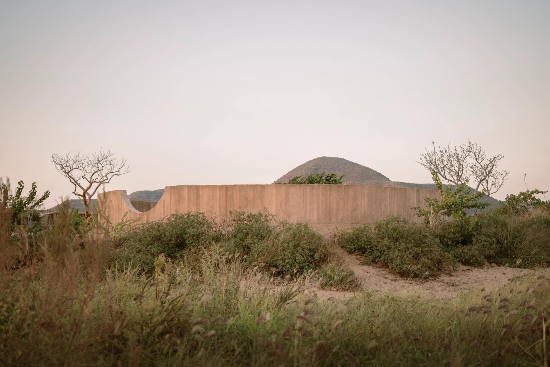 Spiritual Enclosure by Ruben Valdez — The Spiritual Enclosure presents itself as a monolithic concrete intervention set within the Baja California Desert scrubland.