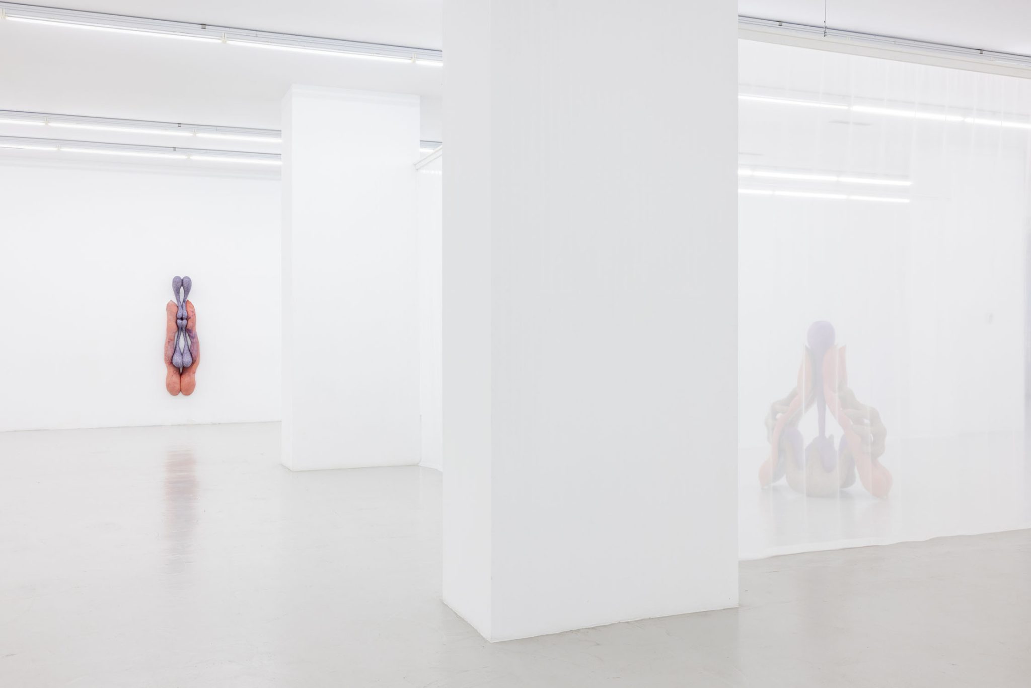 Viscous Group Show at Cassina Projects — A ceramic sculpture dominates the left wall of the white-walled gallery, its bulbous terracotta form crowned with a purple spherical element.