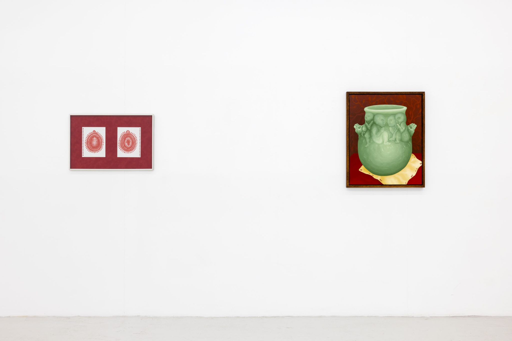 Viscous Group Show at Cassina Projects — Two framed works occupy opposite walls of the gallery: on the left, a burgundy-mounted diptych displaying two identical red-stamped medallions on white...