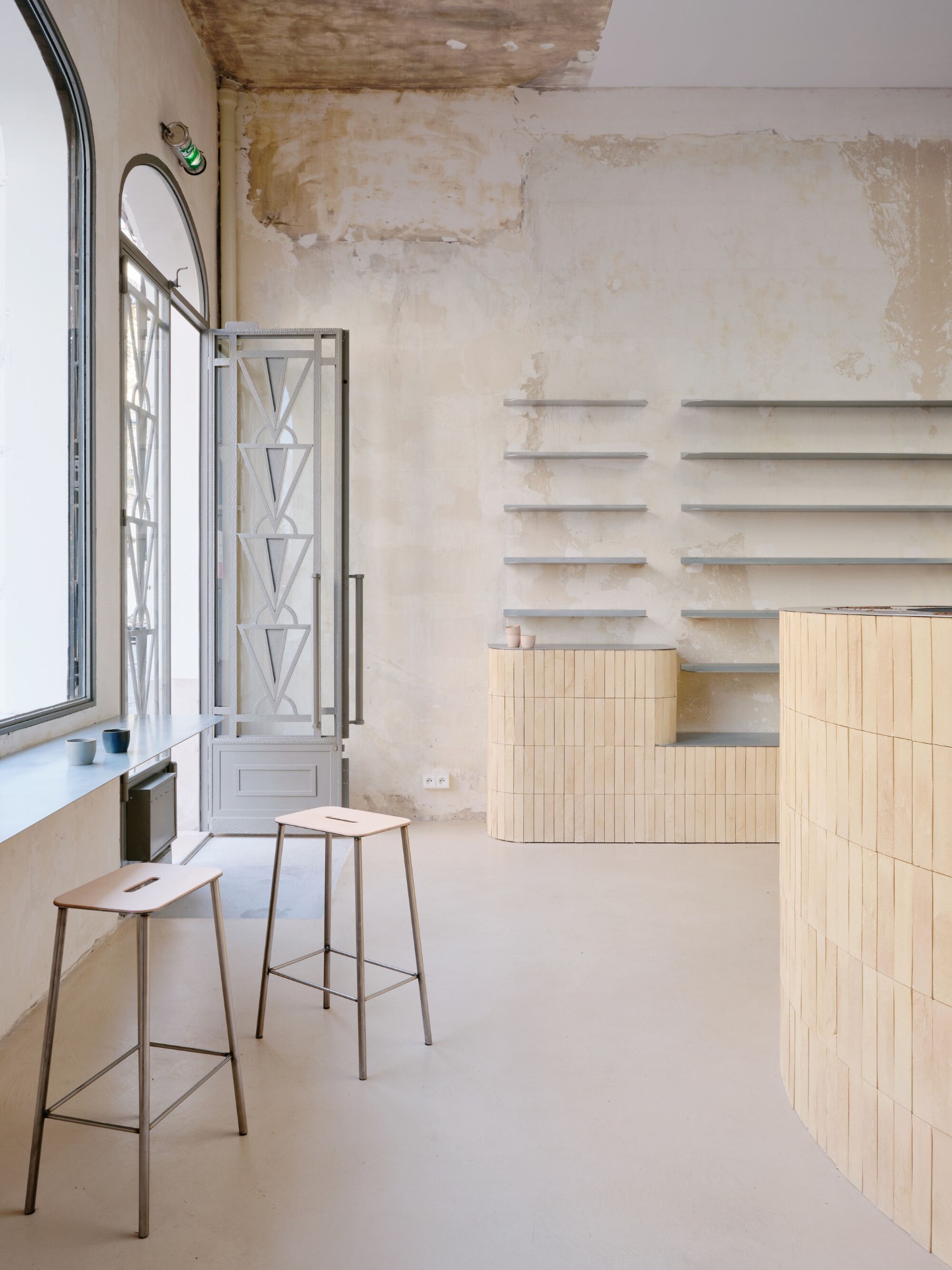 Anbassa by Office Abrami Rojas by Office Abrami Rojas (OAR) — A sparse interior renovation in progress reveals the architectural bones of a Parisian space.