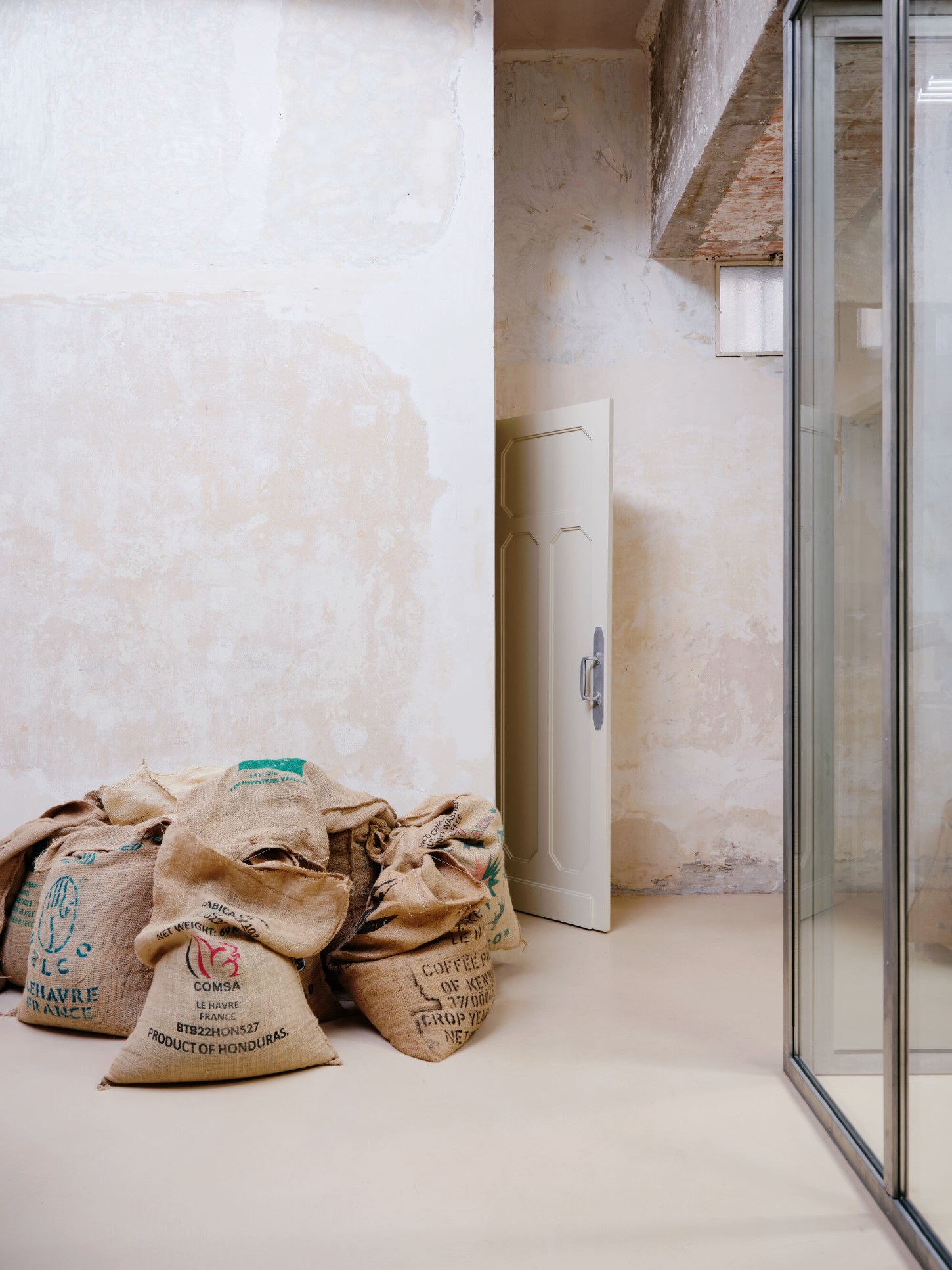 Anbassa by Office Abrami Rojas by Office Abrami Rojas (OAR) — A transitional space within the Anbassa project captures the intersection of material authenticity and functional minimalism.