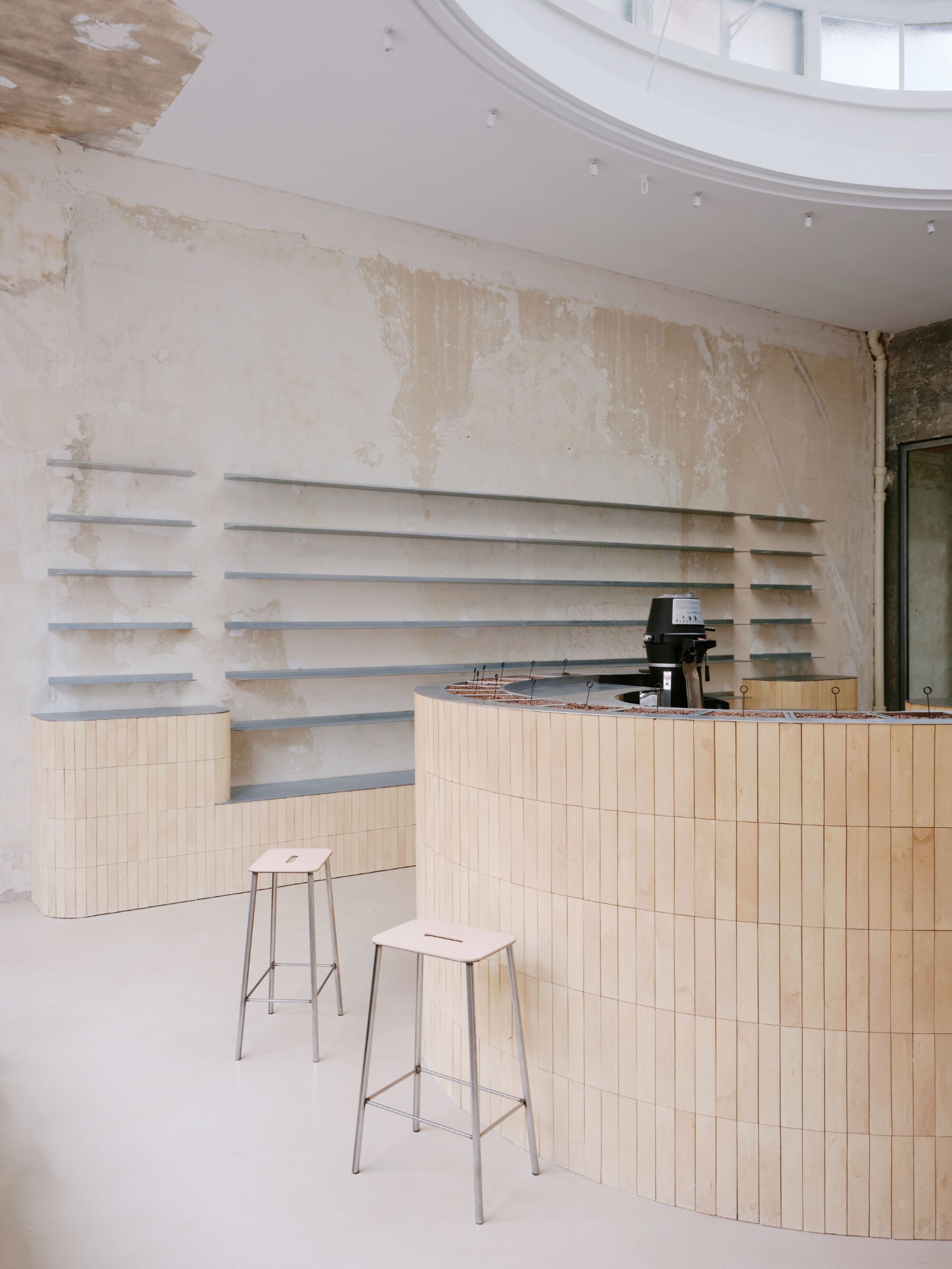 Anbassa by Office Abrami Rojas by Office Abrami Rojas (OAR) — The interior reveals a space in transition between demolition and completion.