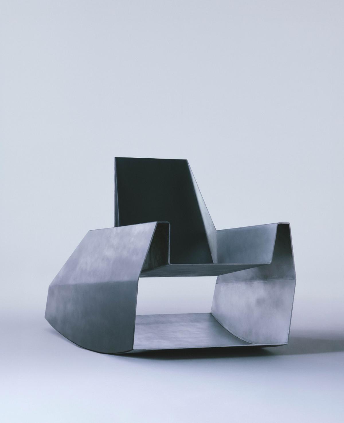 Godspeed by Waiting For Ideas — Godspeed presents a sculptural rocking chair photographed in frontal view against a neutral ground.