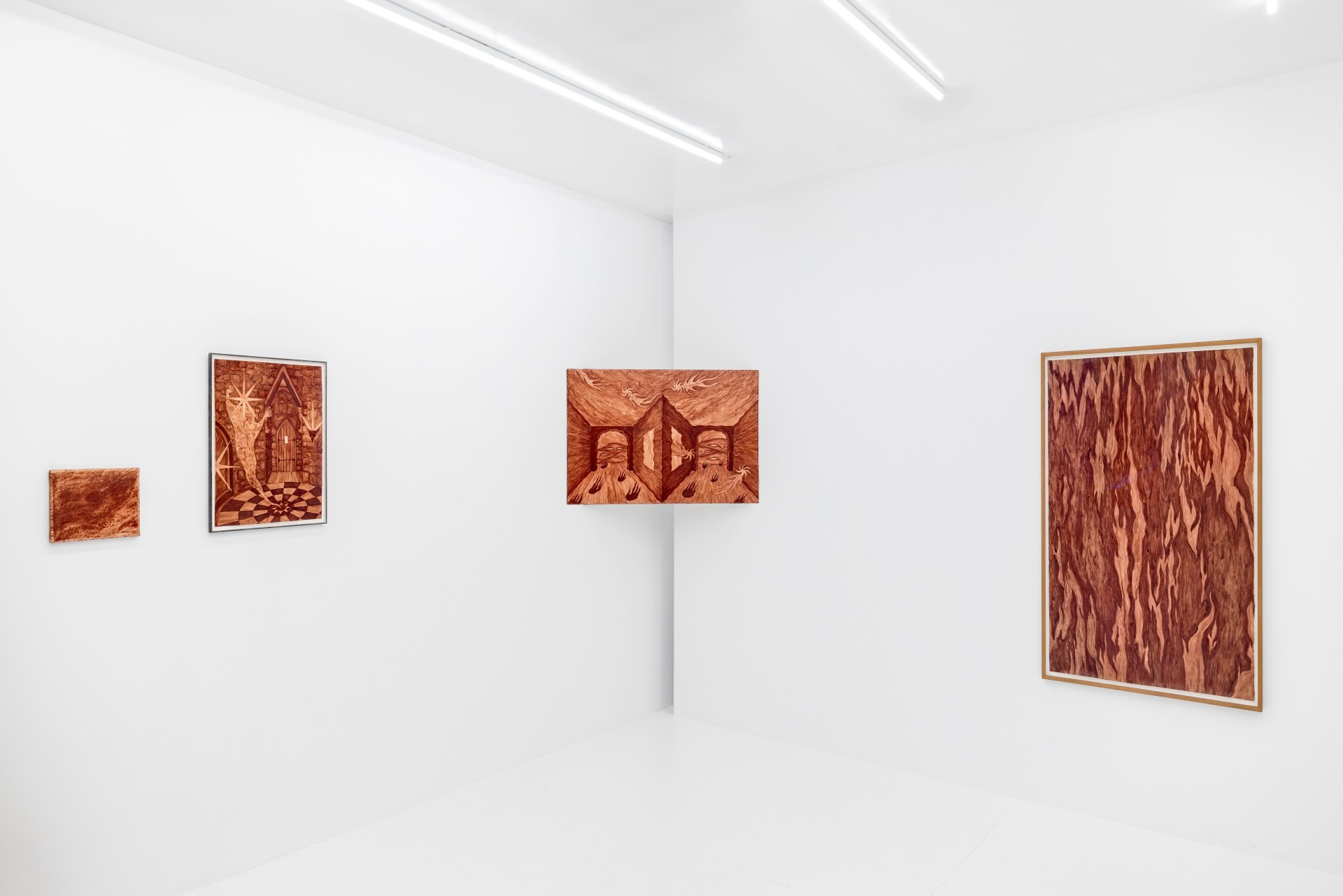Solve & Coagula by Alison Flora at DS Galerie by Thomas Havet — Five framed artworks in rust and terracotta pigments are arranged across white walls in a gallery setting, ranging from small to monumental scale.