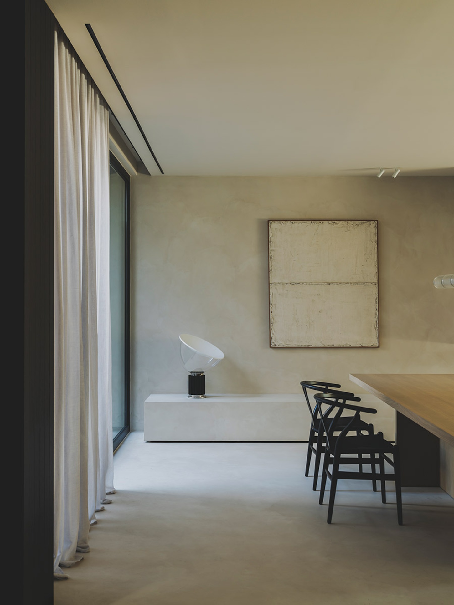 S29 House by Francesc Rifé Studio + Exit Projectes — A dining zone defined by material restraint and geometric clarity.