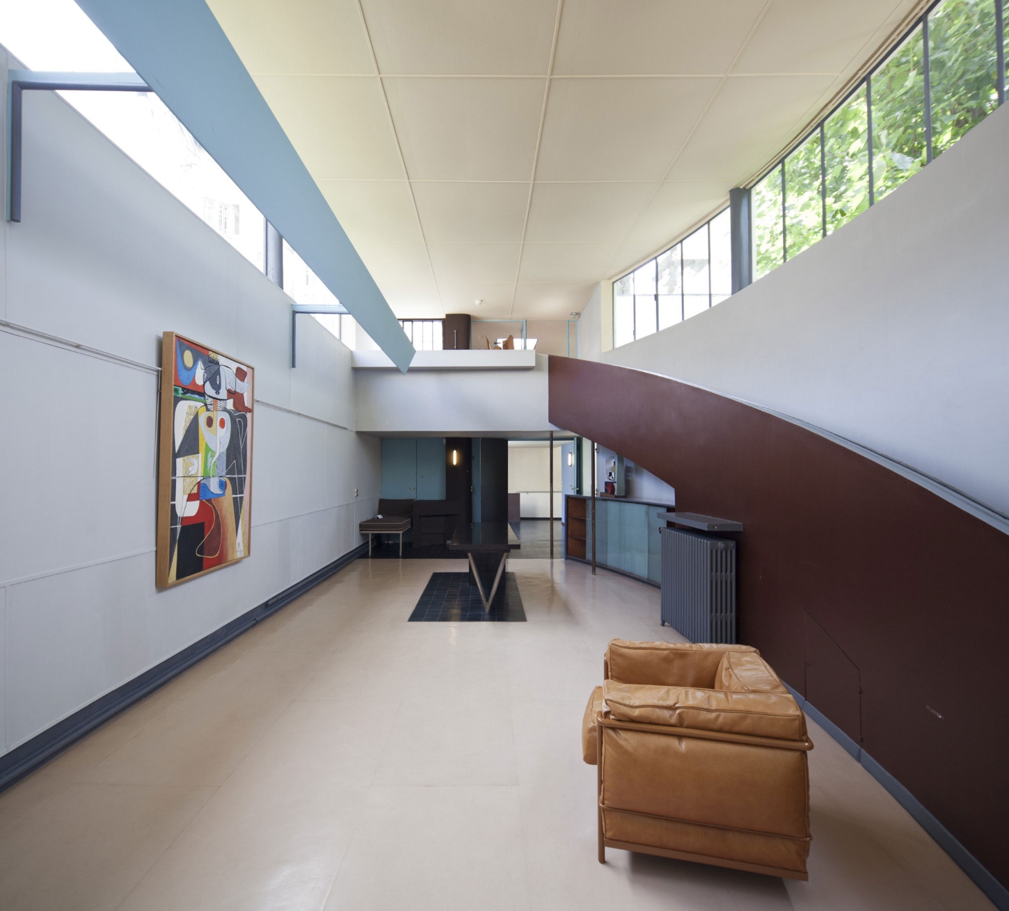 Maison La Roche-Jeanneret by Le Corbusier by Le Corbusier and Pierre Jeanneret — A double-height gallery space in Le Corbusier's seminal 1925 residence showcases the architect's mastery of volumetric composition.