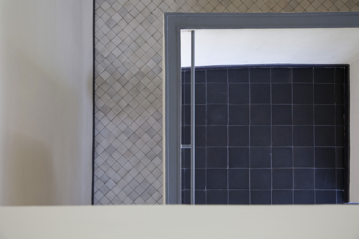 Maison La Roche-Jeanneret by Le Corbusier by Le Corbusier and Pierre Jeanneret — A tilework detail from the Maison La Roche-Jeanneret showcases Le Corbusier's systematic approach to surface treatment.