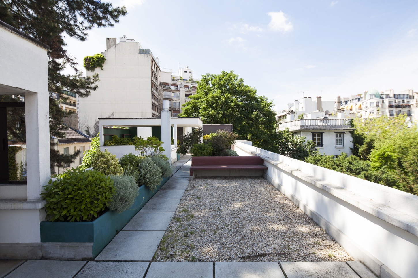 Maison La Roche-Jeanneret by Le Corbusier by Le Corbusier and Pierre Jeanneret — A rooftop terrace of the Maison La Roche-Jeanneret captures the modernist integration of building and landscape.