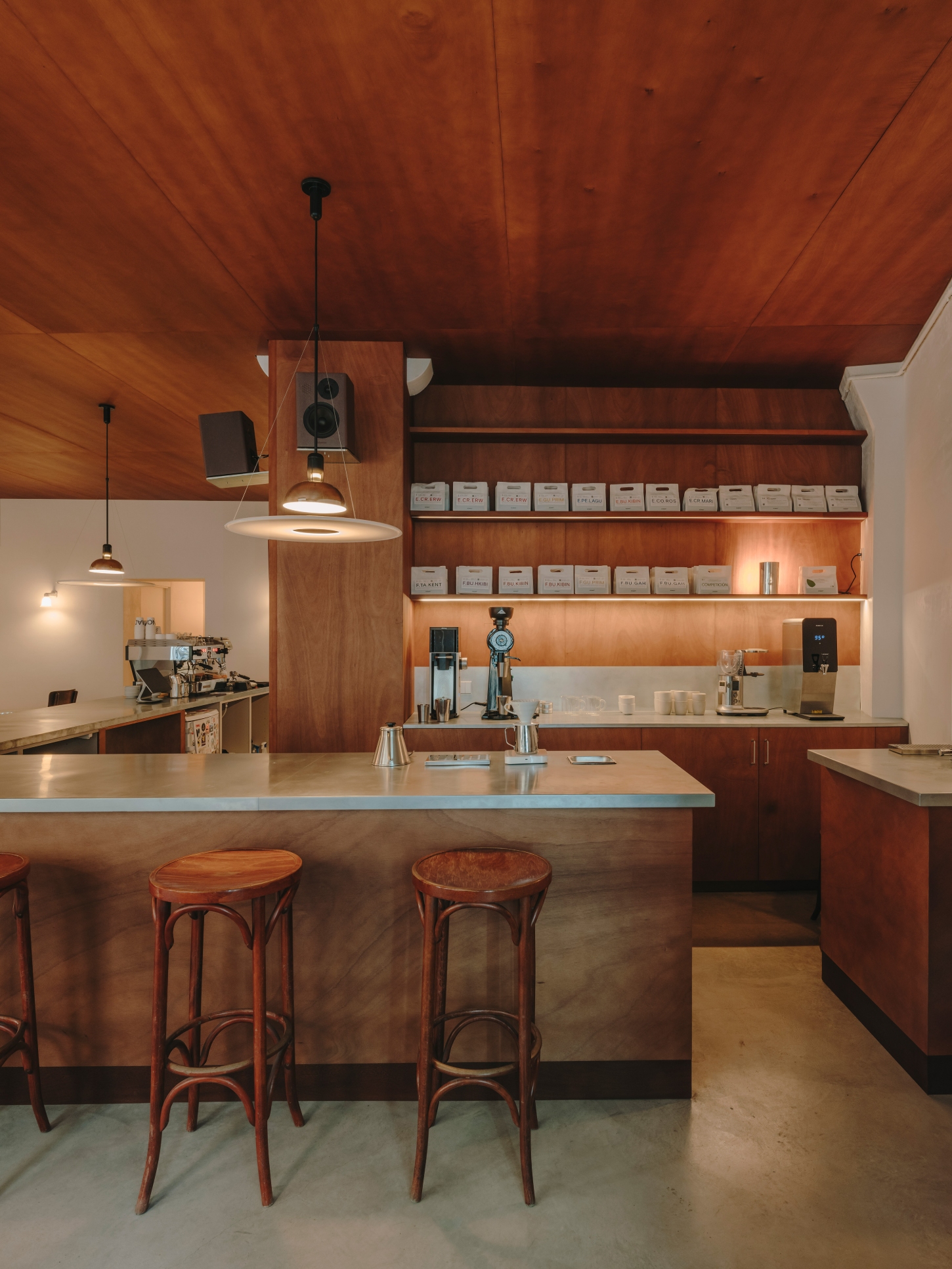 Nomad Coffee Frutas Selectas by Skye Maunsell and Jordi Veciana — The café counter establishes the spatial and material heart of Nomad Coffee.