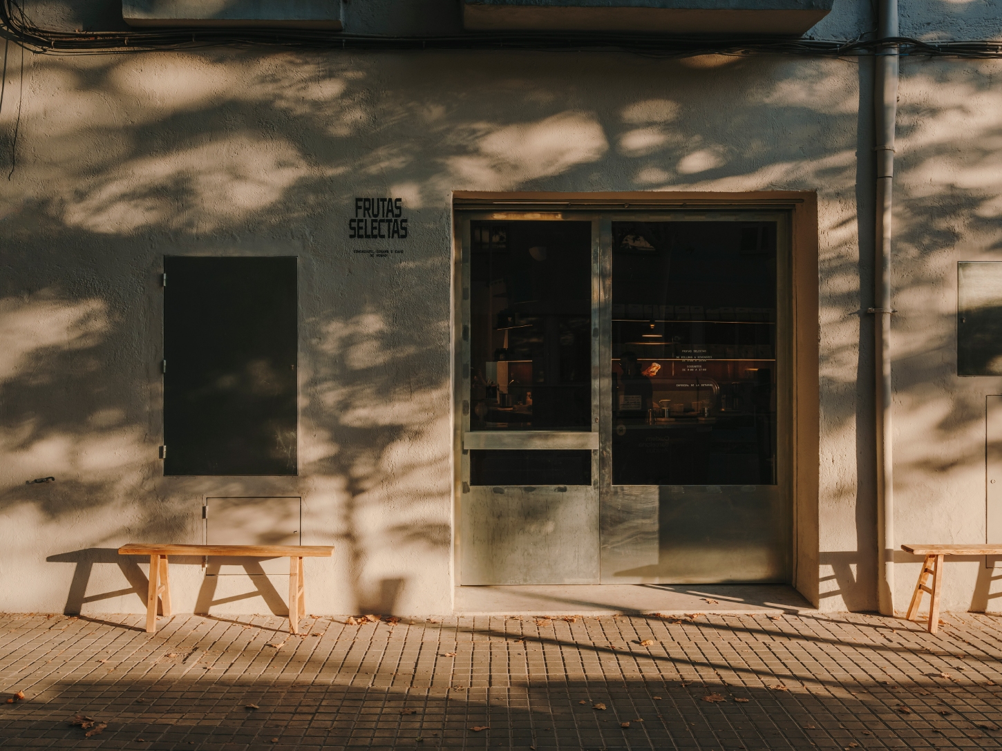 Nomad Coffee Frutas Selectas by Skye Maunsell and Jordi Veciana — The storefront presents a studied restraint in material expression.