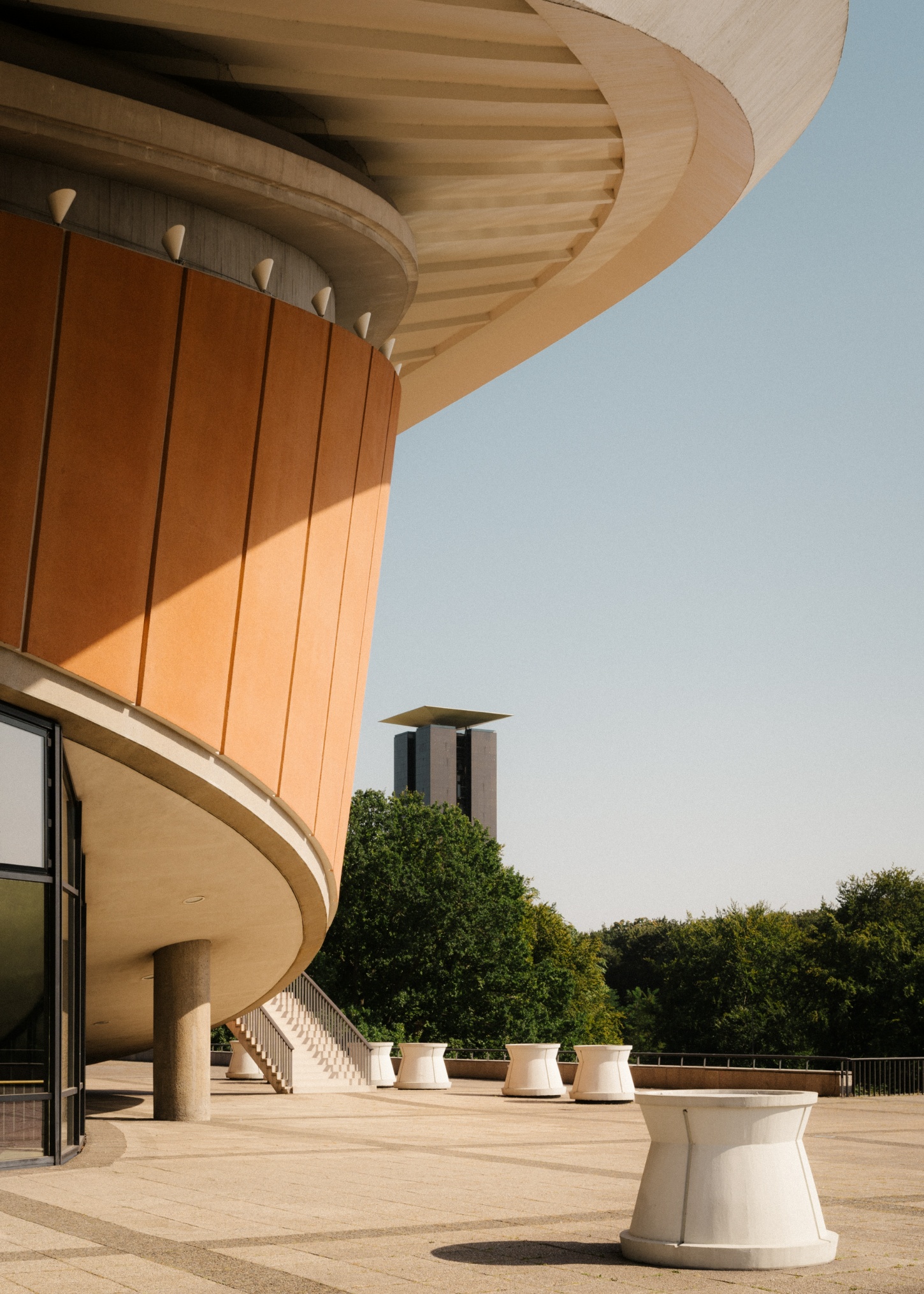 Berlin's Haus der Kulturen der Welt captured by Nate Cook by Hugh Stubbins — Nate Cook's photograph captures the Haus der Kulturen der Welt from its terrace level, emphasizing the massive cantilever of Hugh Stubbins' 1957 roof structure.