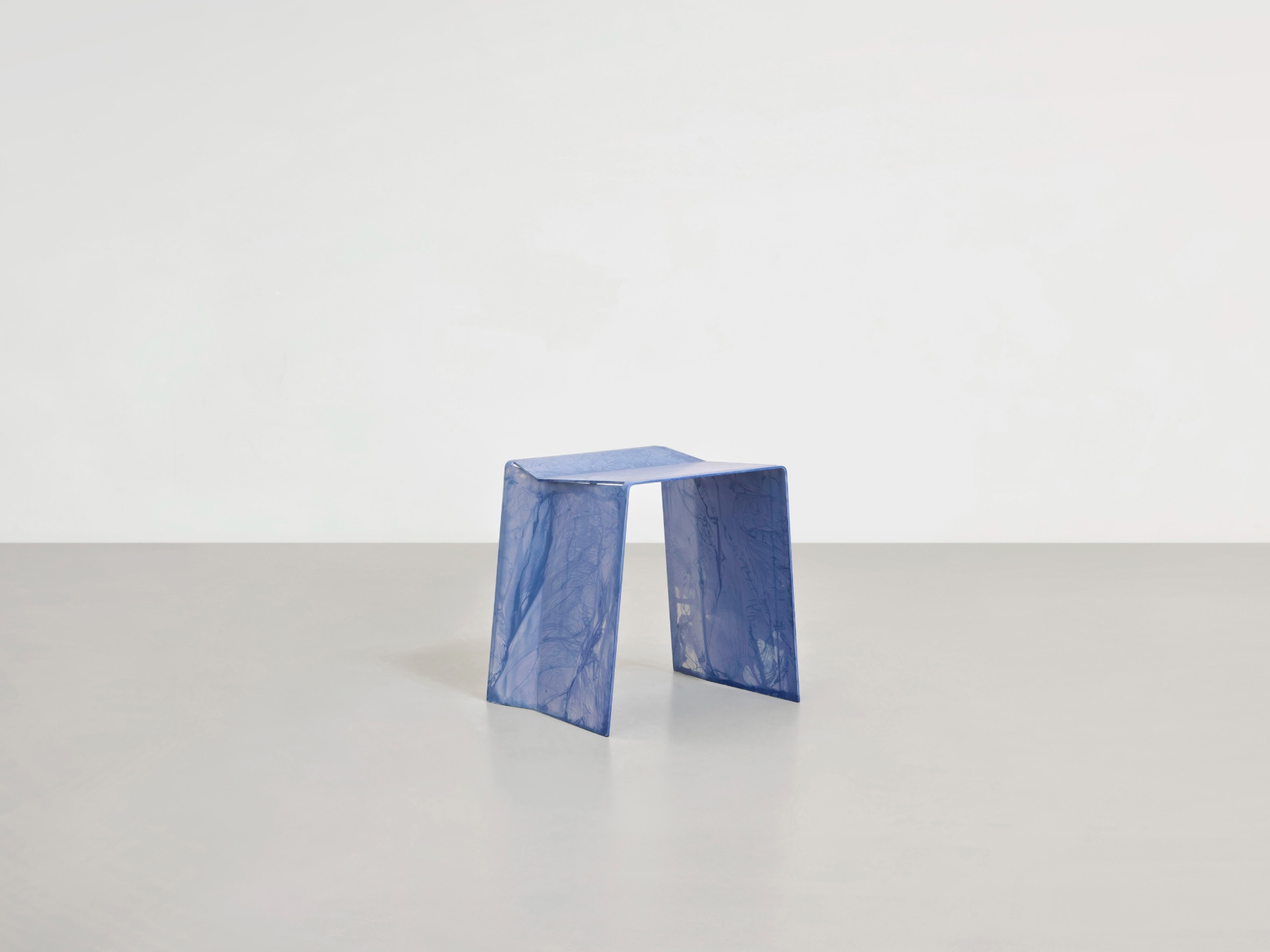 Anodized Collection by Paul Coenen — A hand-anodized aluminum stool from the Anodized Collection demonstrates Paul Coenen's signature technique of controlled material unpredictability.