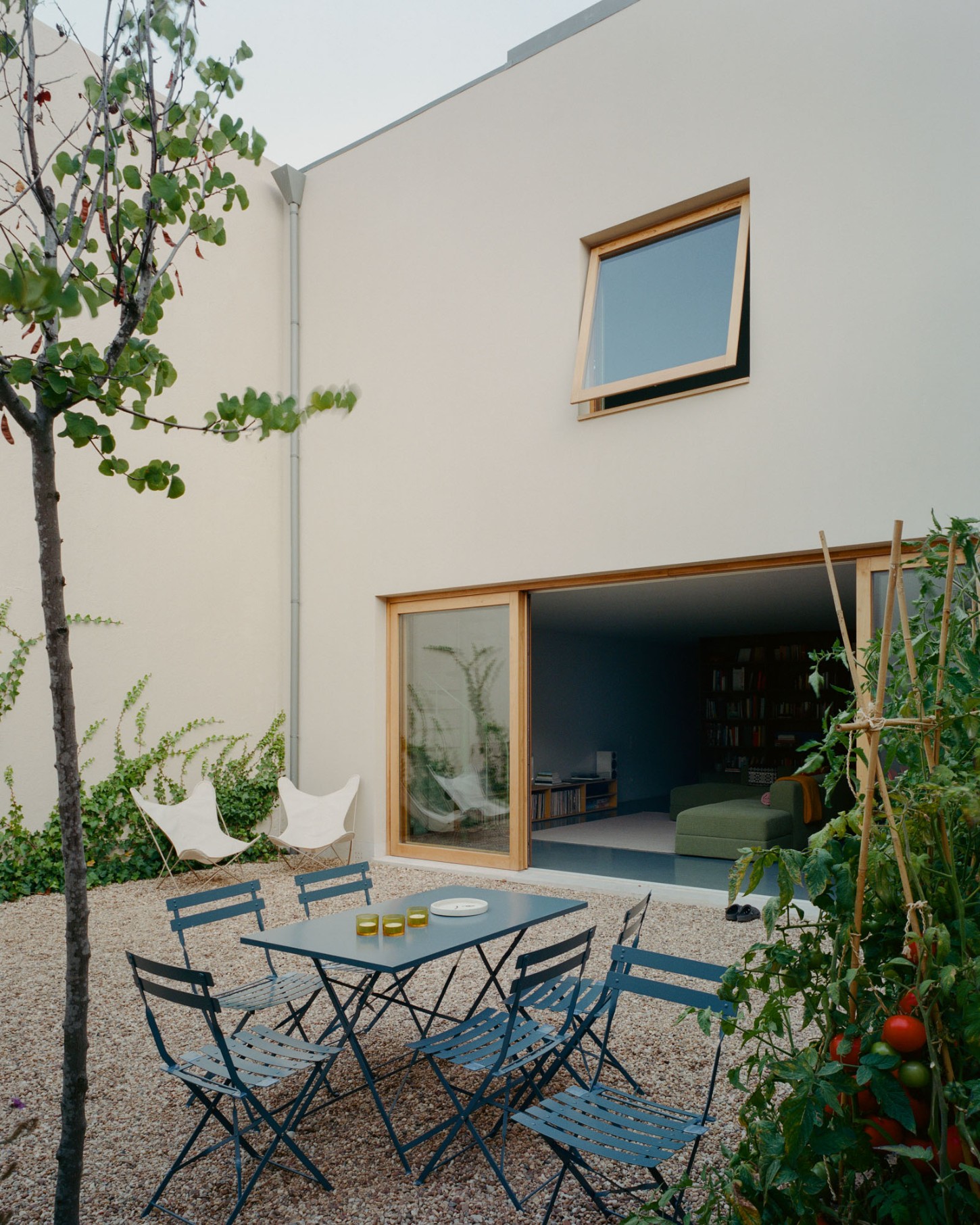 Marvilla House by Atelier José Andrade Rocha — A courtyard vignette framed by the modernist intervention.