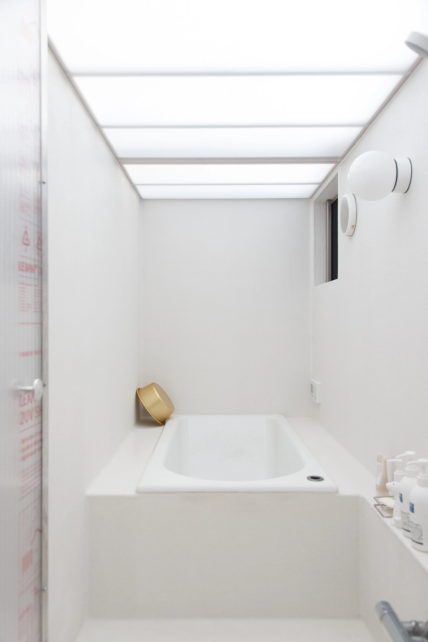 House A/Shop B (Bolts Hardware Store) by KimuraMatsumoto Architects — A newly constructed bathroom interior within the House A/Shop B project, stripped of finishes and captured mid-construction.