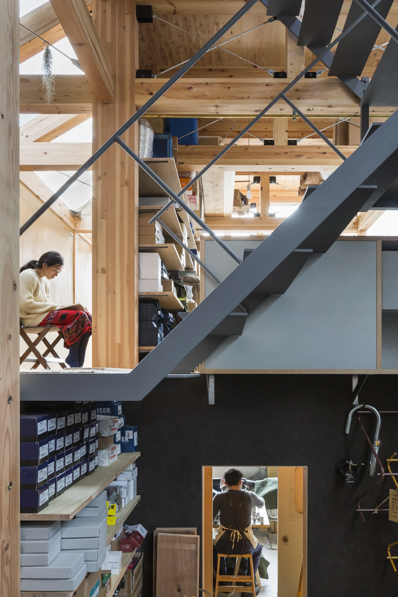 House A/Shop B (Bolts Hardware Store) by KimuraMatsumoto Architects — An overhead view of House A/Shop B reveals the compressed vertical stacking of program across multiple floors.