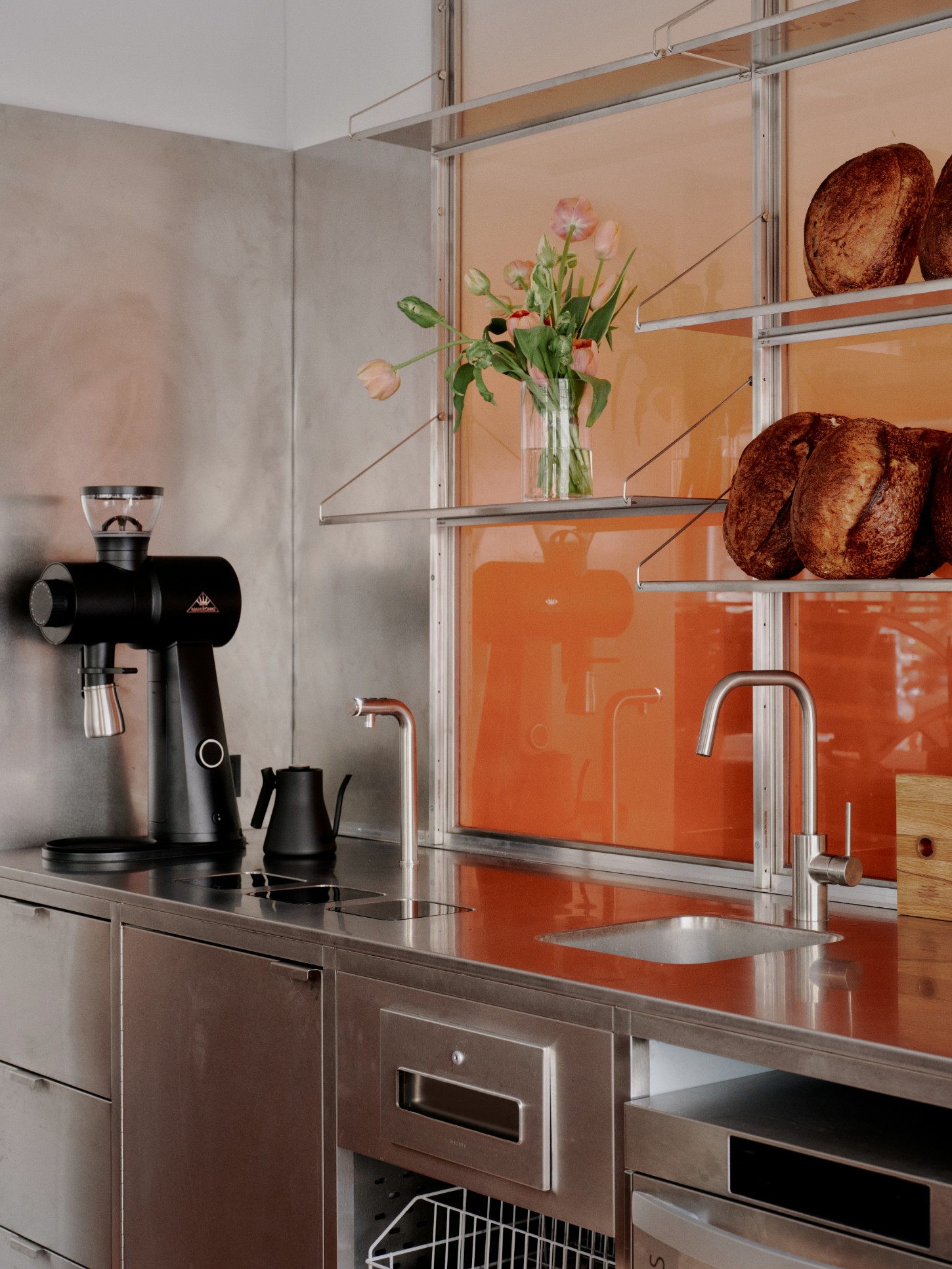 ACID Cafe by Plantea Studio by Plantea Estudio — ACID Cafe's kitchen counter demonstrates a studied materiality through deliberate juxtaposition.
