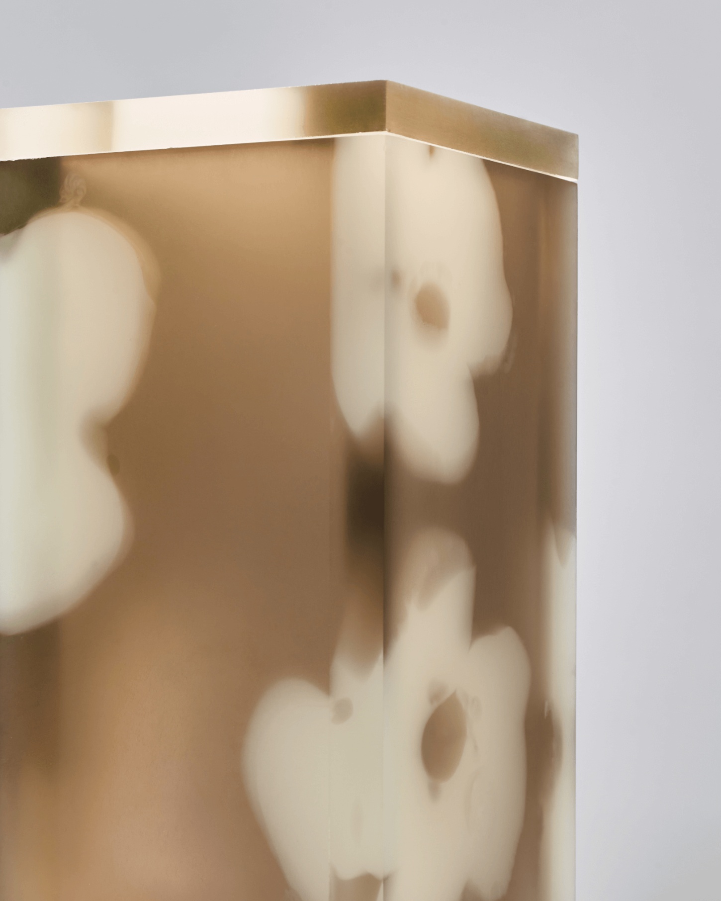 Selected Works by Forever Studio — A timber vessel or sculptural object featuring precision-drilled circular perforations arranged in a regular grid pattern across its surface.