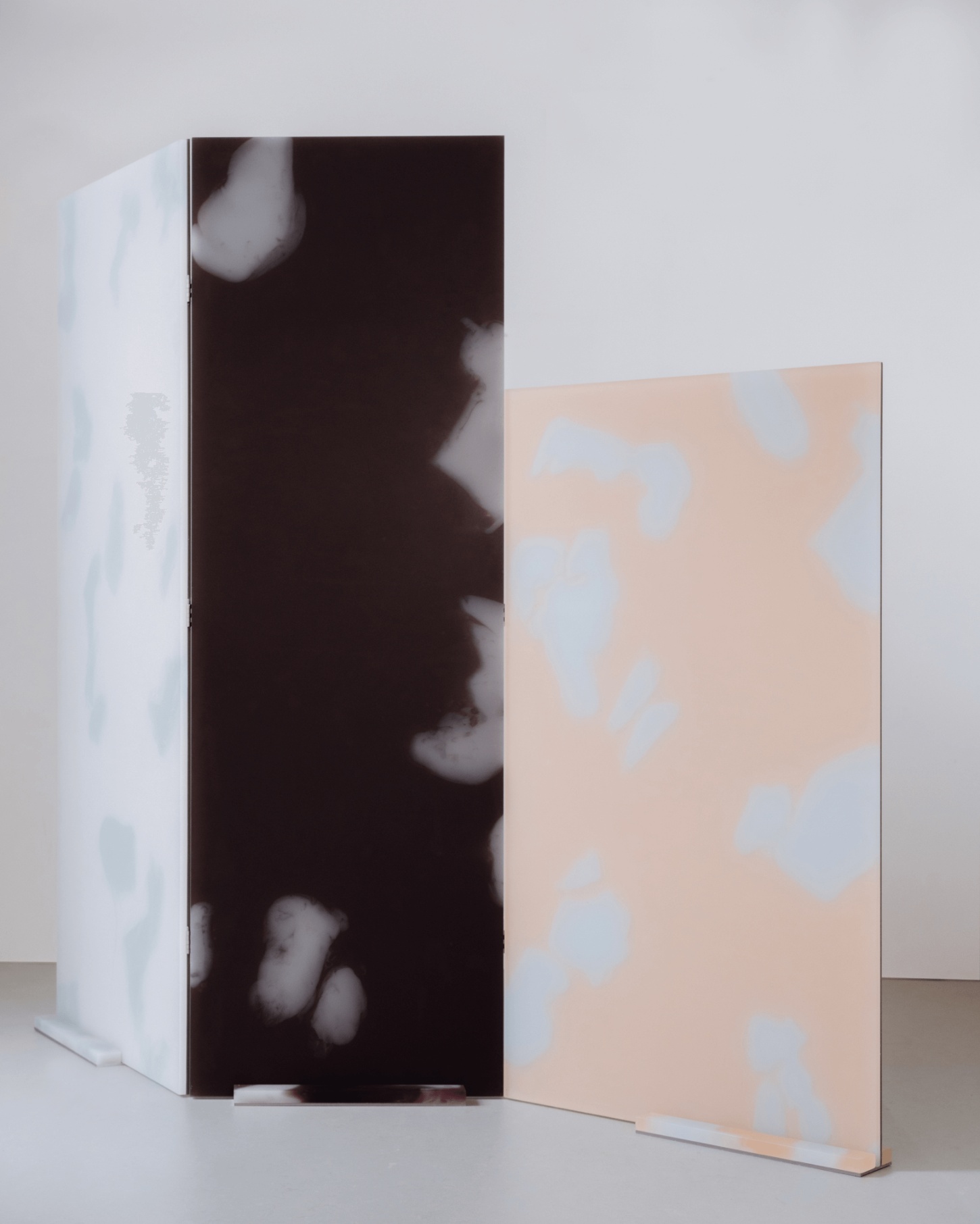Selected Works by Forever Studio — A sculptural wooden partition comprising two perpendicular panels in contrasting finishes.