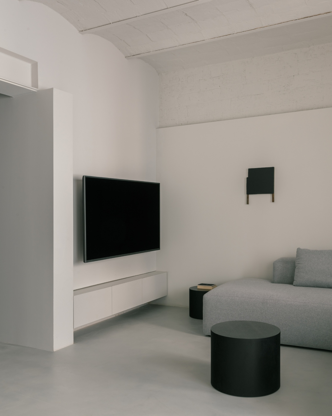 Casa Norte by CORREA Studio — A minimalist living space defined by chromatic and material contrast.