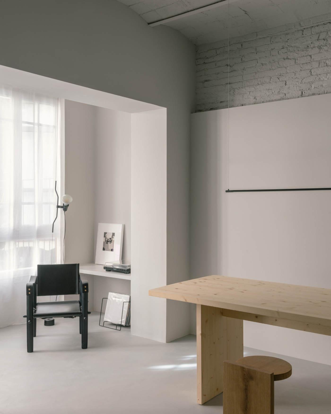 Casa Norte by CORREA Studio — A sectional view of the apartment's unified living space captures the chromatic and material dialogue between distinct zones.