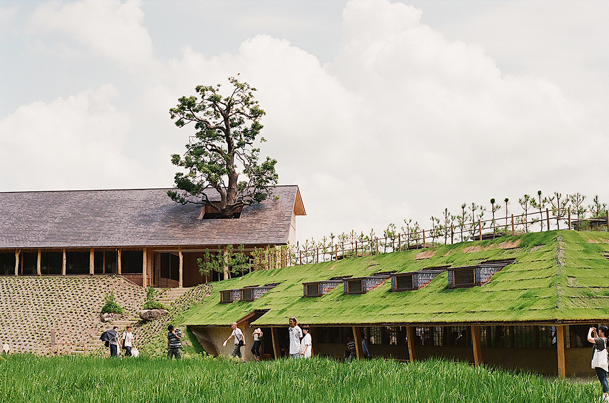 La Collina Ōmi-Hachiman by Terunobu Fujimori + Michele De Lucchi — La Collina's hillside setting reveals the architectural intervention's relationship to topography.