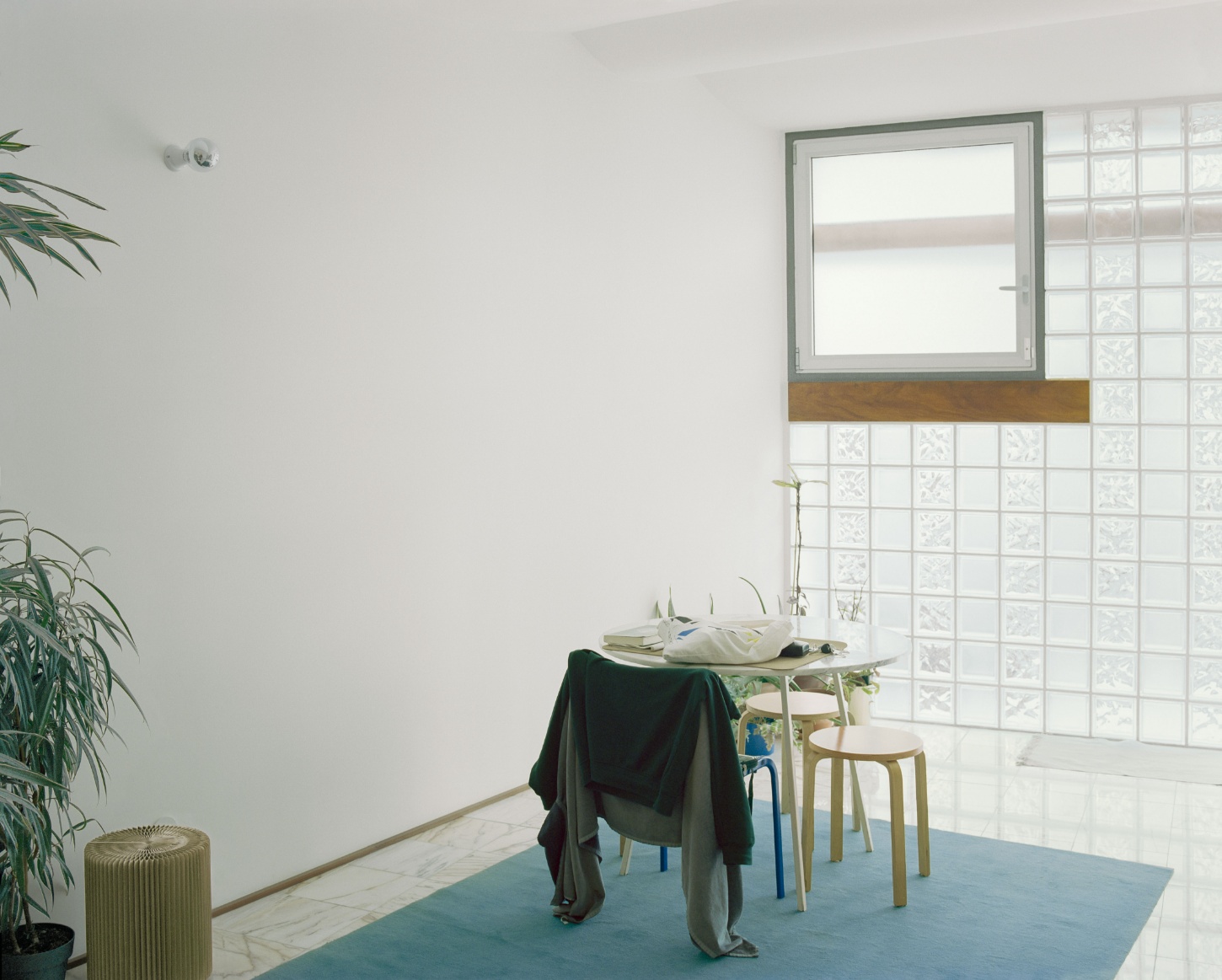 'Fireworks in White' by Willem Pab — A dining vignette defined by material and chromatic restraint.