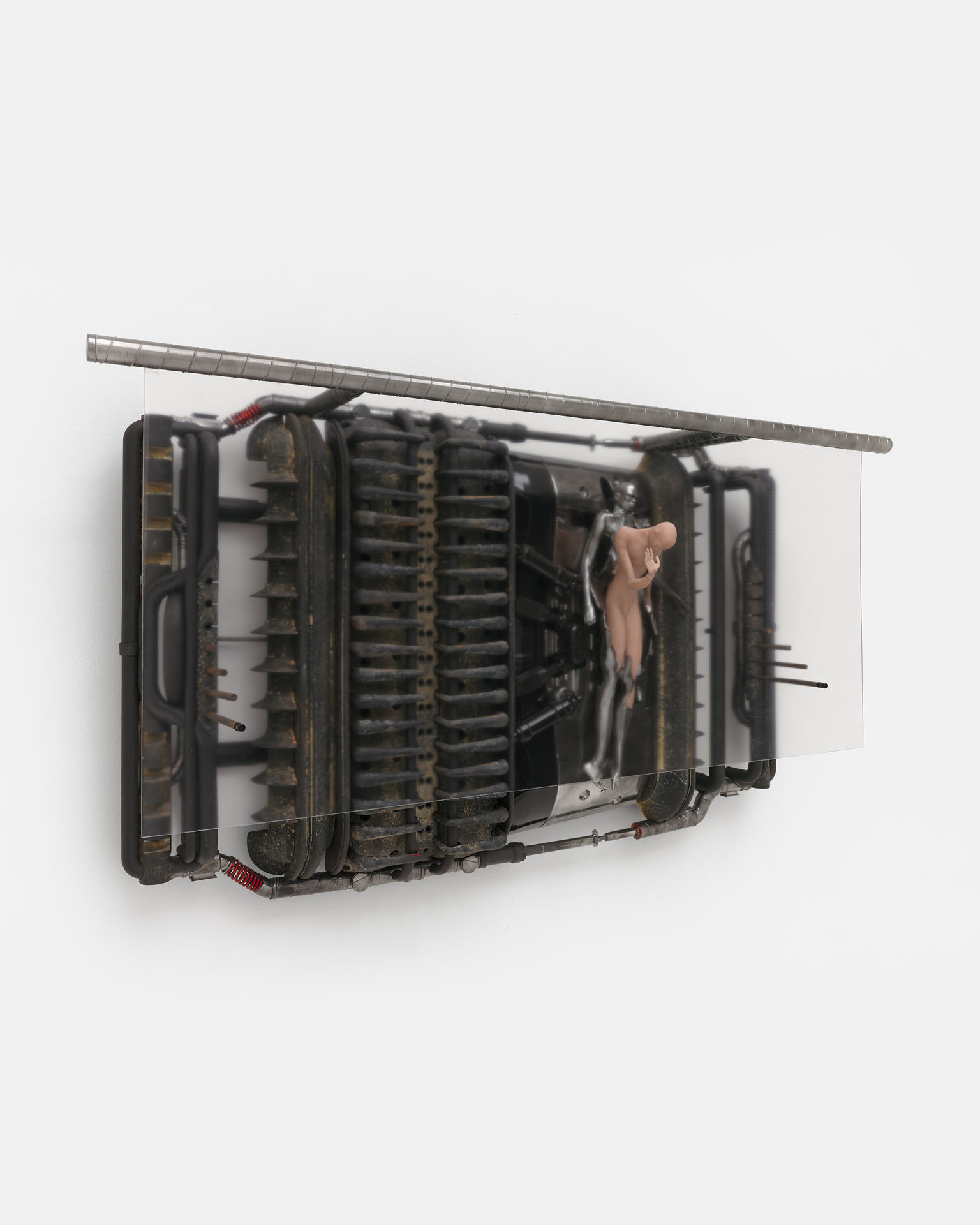 ENDO– by Taylor Ashby Hawkins at ASHES/ASHES — Taylor Ashby Hawkins presents a wall-mounted sculptural assembly that deconstructs the mechanics of human-machine interfaces.