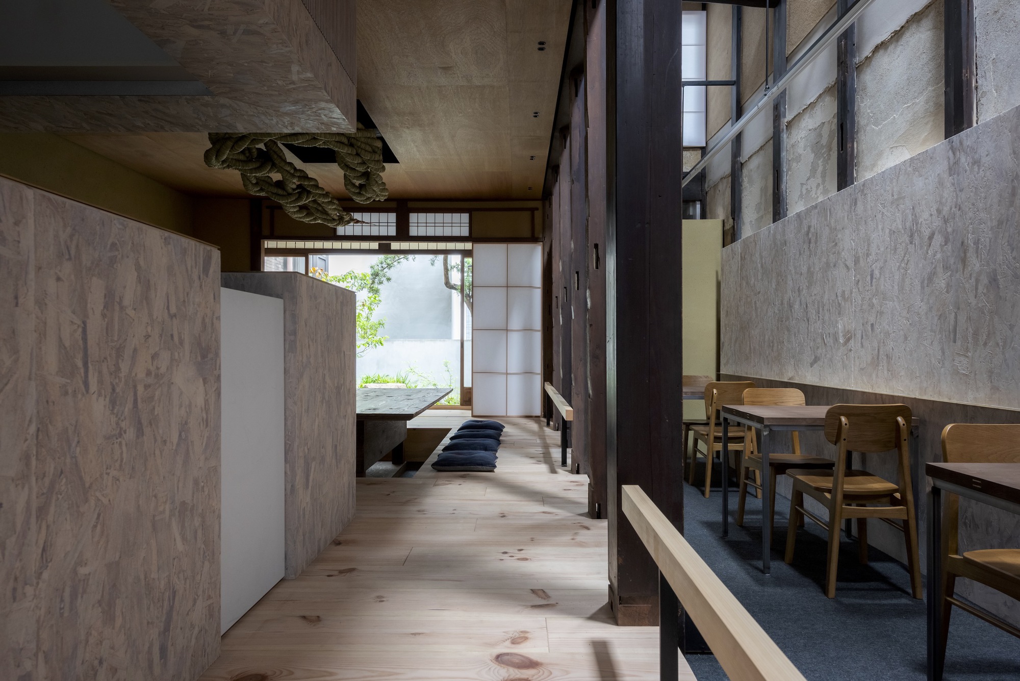 Kawamichiya Kosho-An Restaurant by td-Atelier + Endo Shorijo Design by td-Atelier and Endo Shorijo Design — A linear corridor passage within the restored townhouse frames multiple spatial zones.
