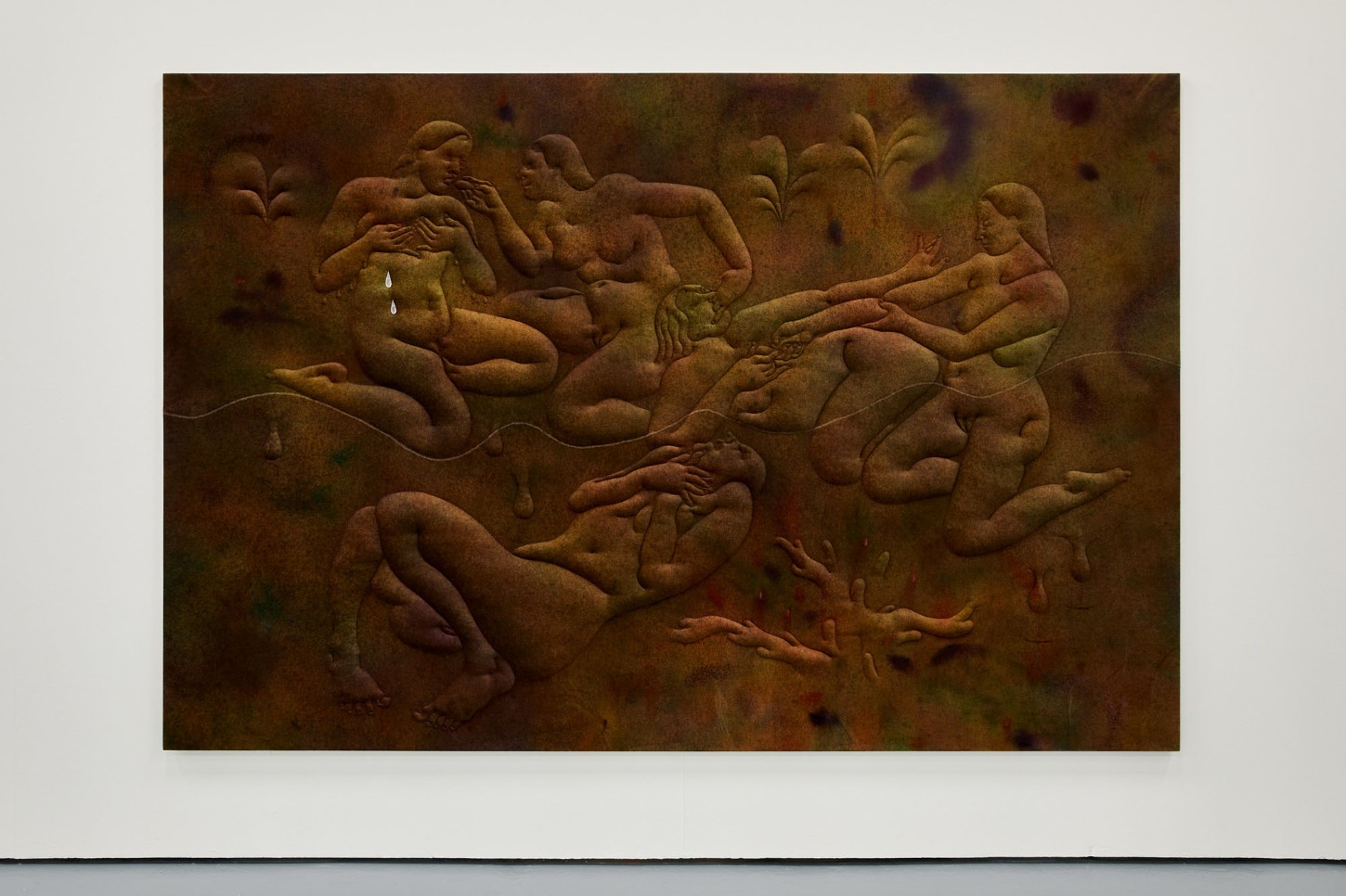 Thirst by Eliška Konečná at Polansky — A sandstone relief carving depicting multiple overlapping nude figures in various recumbent and seated poses.