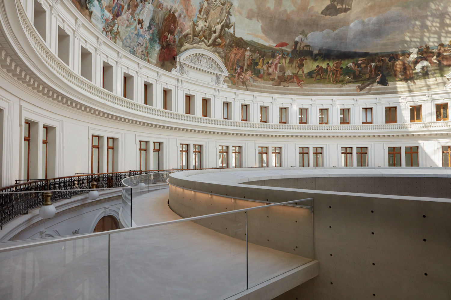 Paris' La Bourse de Commerce redesigned by Tadao Ando — Tadao Ando's intervention within La Bourse de Commerce's rotunda manifests as a monolithic concrete cylinder, nine meters tall, positioned centrally within...
