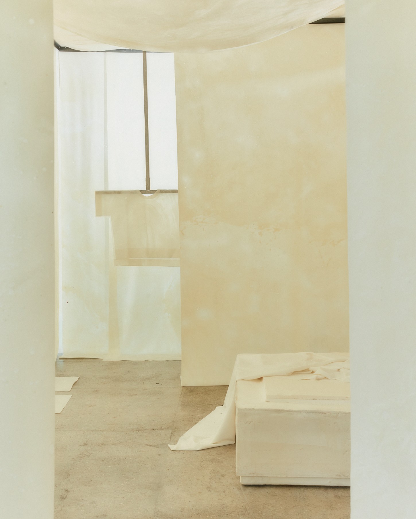 'White Utopia' by Natural Material Studio — A walk-in wardrobe interior constructed entirely from Procel bioplastic, featuring modular storage units arranged in an asymmetric composition.