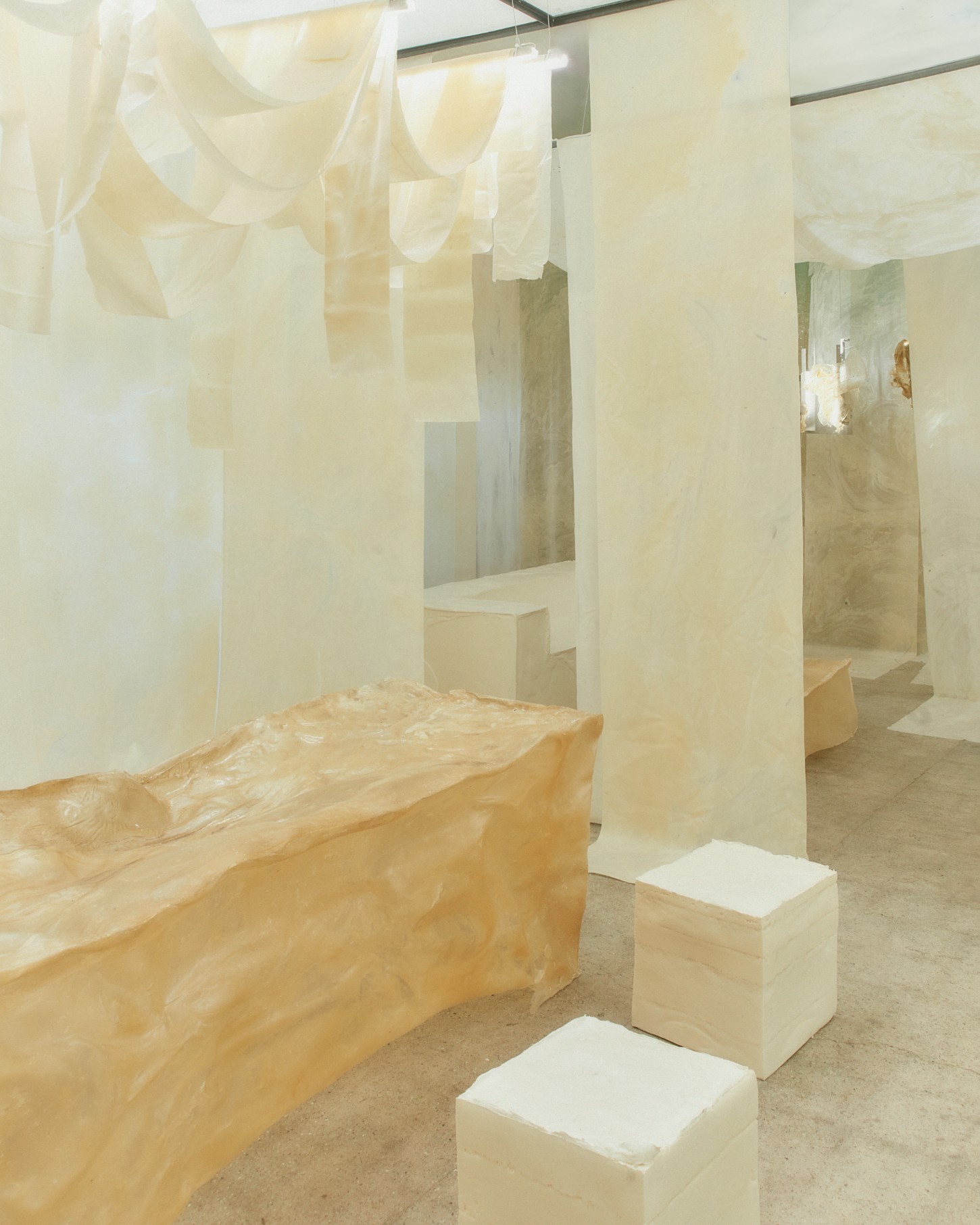 'White Utopia' by Natural Material Studio — Natural Material Studio's bioplastic installation demonstrates material cohesion through continuous curved forms.